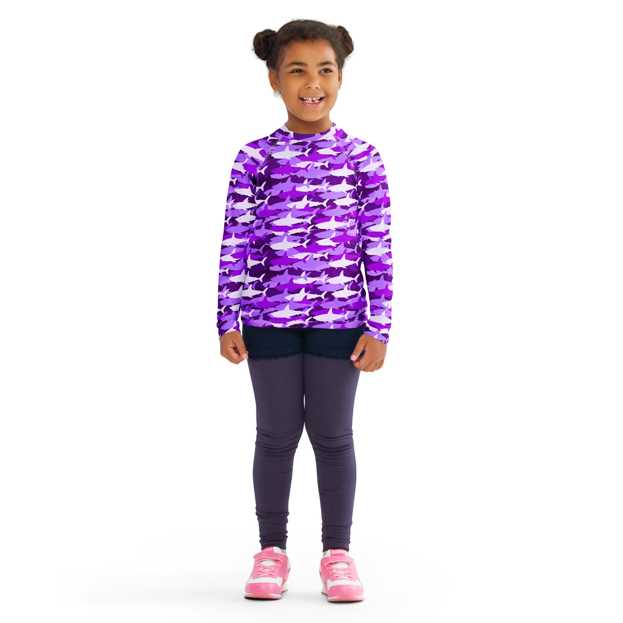 Girls purple and white shark-patterned long sleeve rash guard swim shirt with upf 50 plus for sun protection