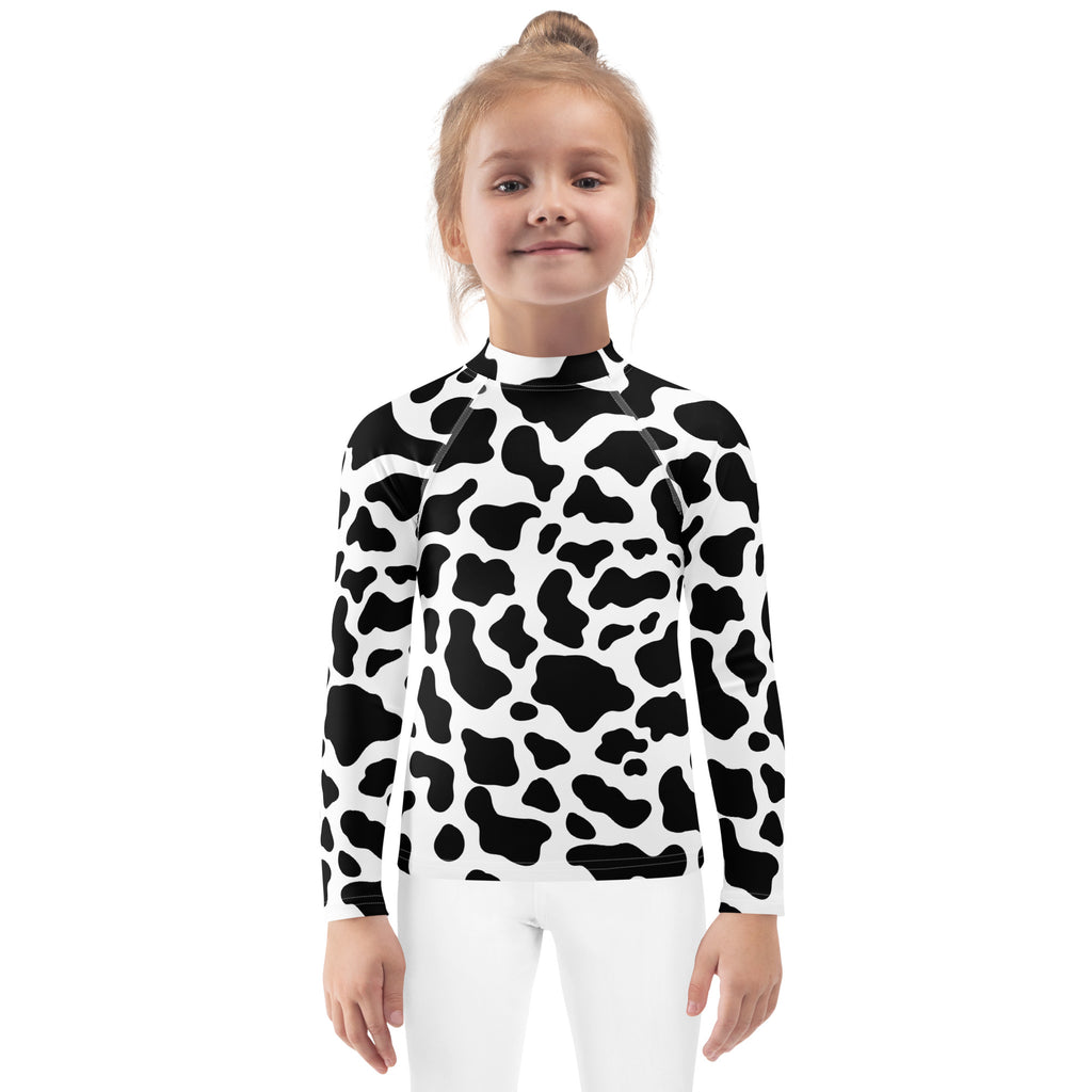 Kids cow print long sleeve rash guard swim shirt with UPF 50 plus in black and white for sun protection