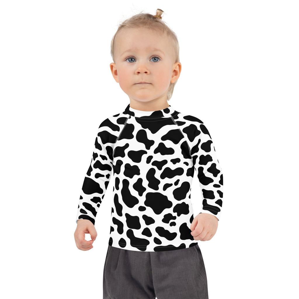 Kids cow print long sleeve rash guard swim shirt with upf 50 plus featuring black and white cow pattern