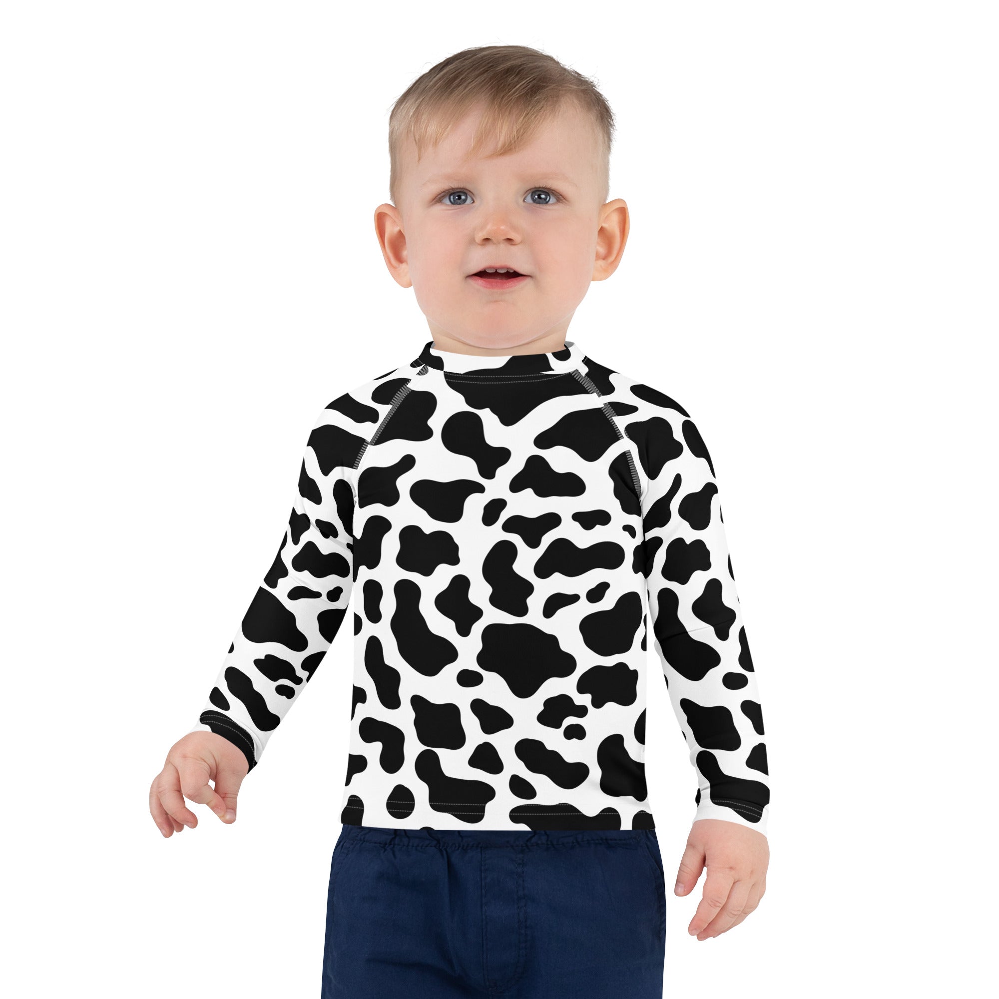 Kids cow print long sleeve rash guard swim shirt in black and white with upf 50 plus for sun protection