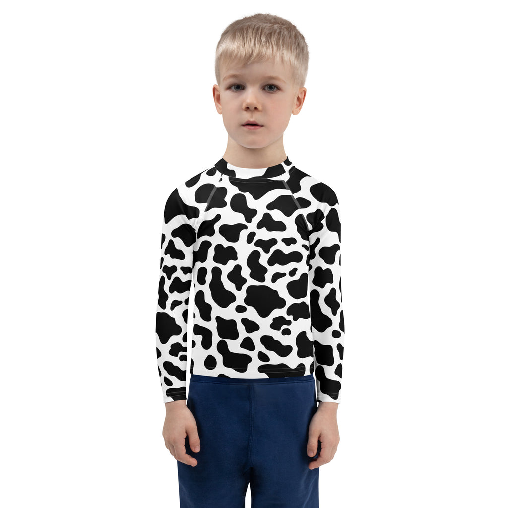 Kids cow print long sleeve rash guard swim shirt with upf 50 plus in black and white for sun protection
