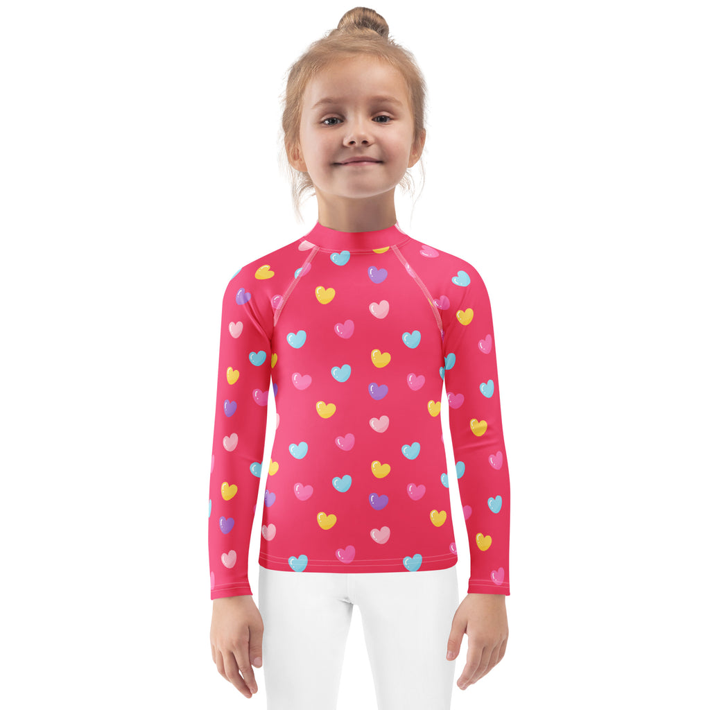 Girls colorful hearts pink long sleeve rash guard swim shirt with UPF 50 plus and multicolored heart pattern