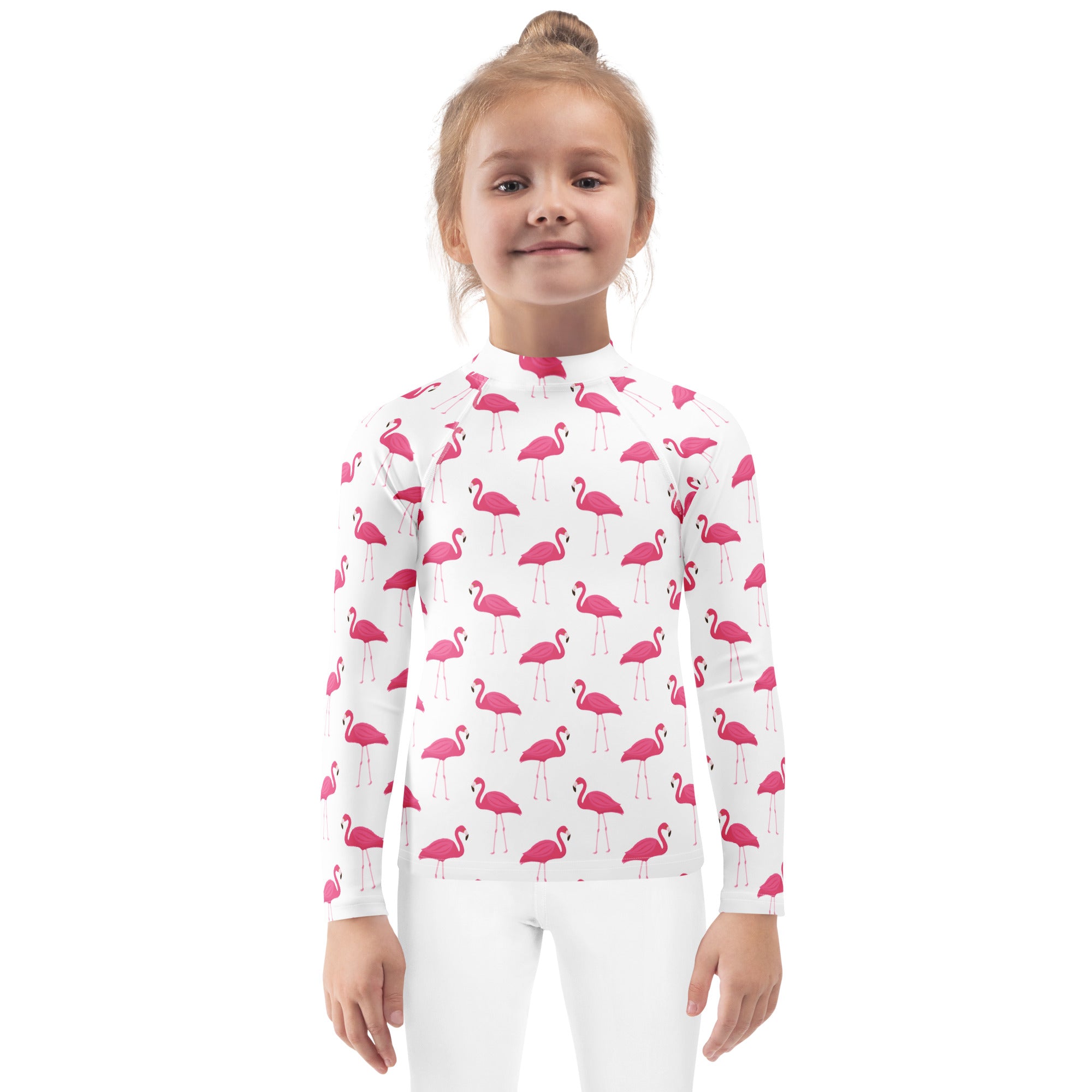 White long sleeve kids rash guard swim shirt with pink flamingo pattern and UPF 50 plus sun protection