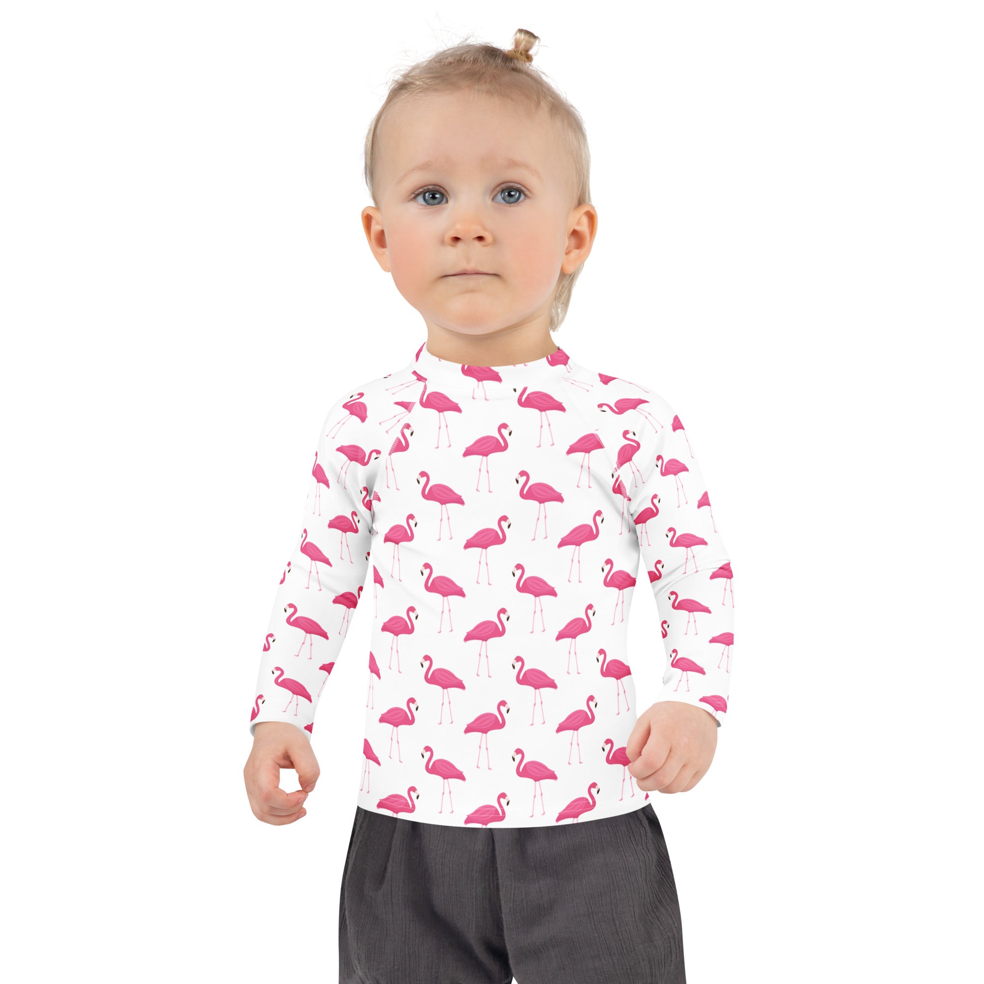 Kids pink flamingo long sleeve rash guard swim shirt in white with upf 50 plus for sun protection