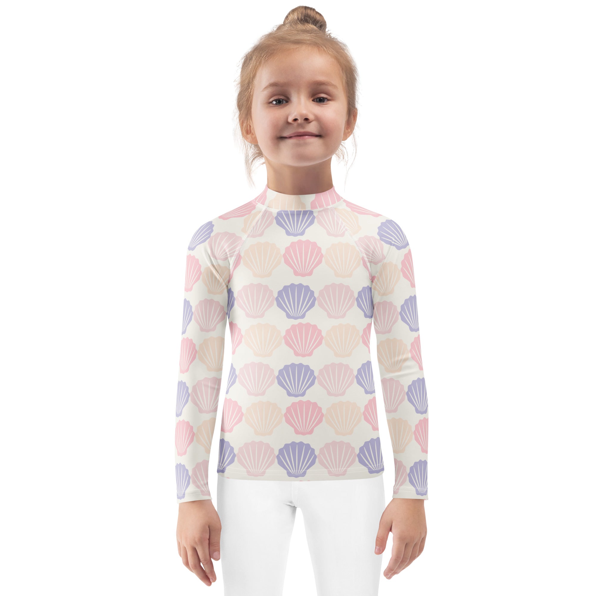 Kids seashell print long sleeve rash guard swim shirt with upf 50 plus featuring pink and lavender seashells on off white