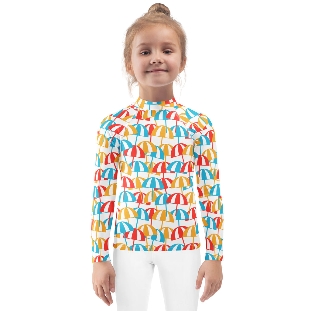 Kids beach umbrella long sleeve rash guard swim shirt with upf 50 featuring red blue and yellow umbrellas on white
