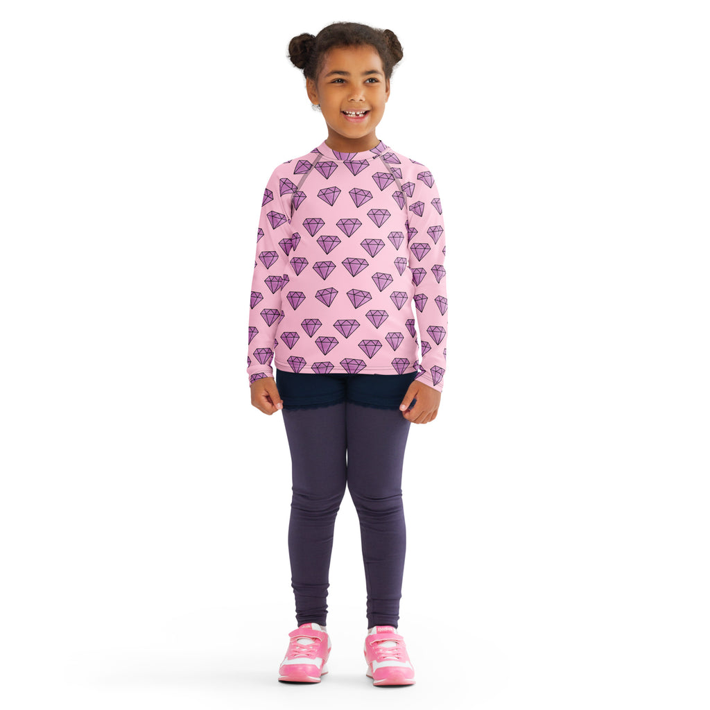 Girls purple diamonds long sleeve rash guard swim shirt with upf 50 plus featuring pink fabric and purple diamond pattern
