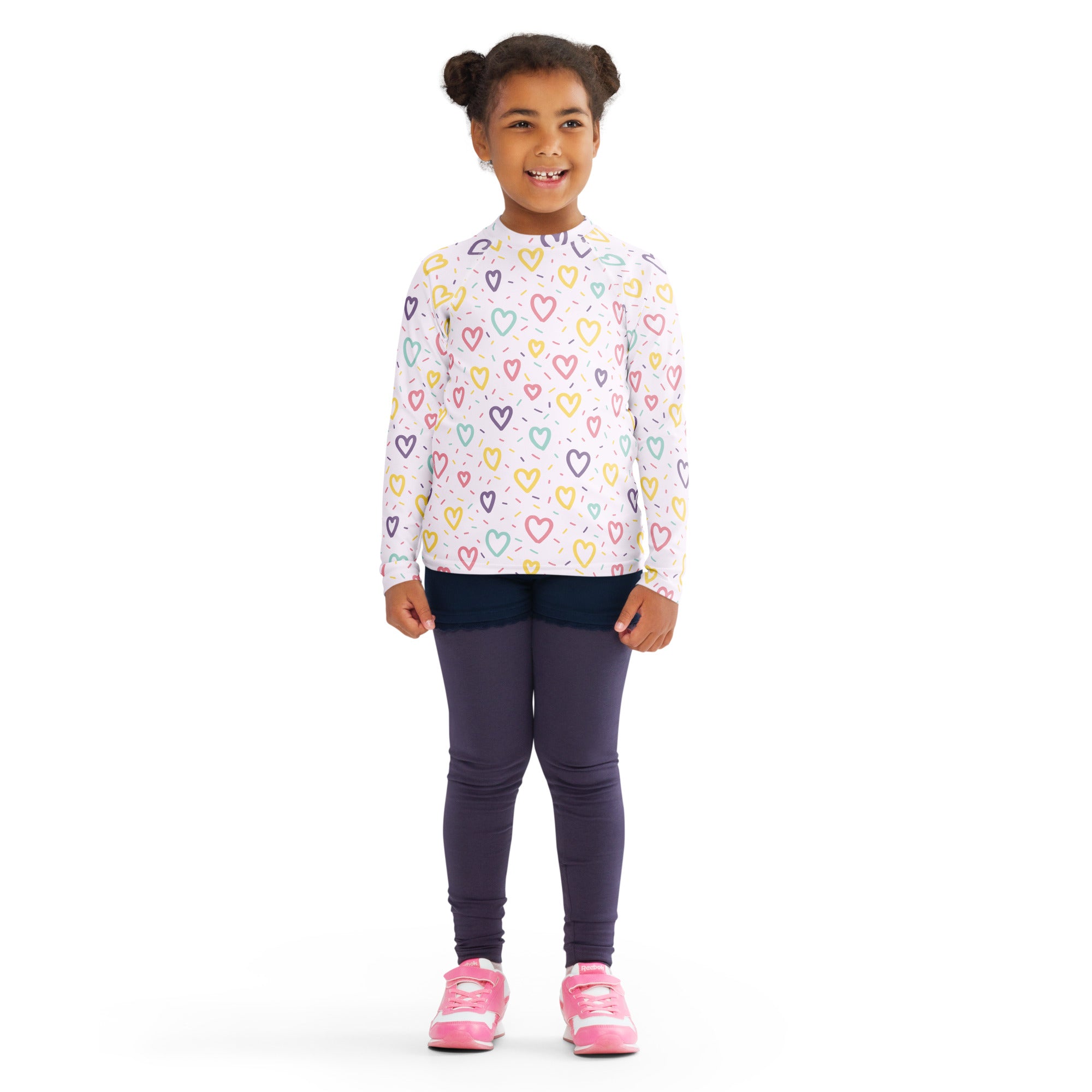 Girls hearts and sprinkles long sleeve rash guard swim shirt with upf 50 plus white base and colorful pastel hearts