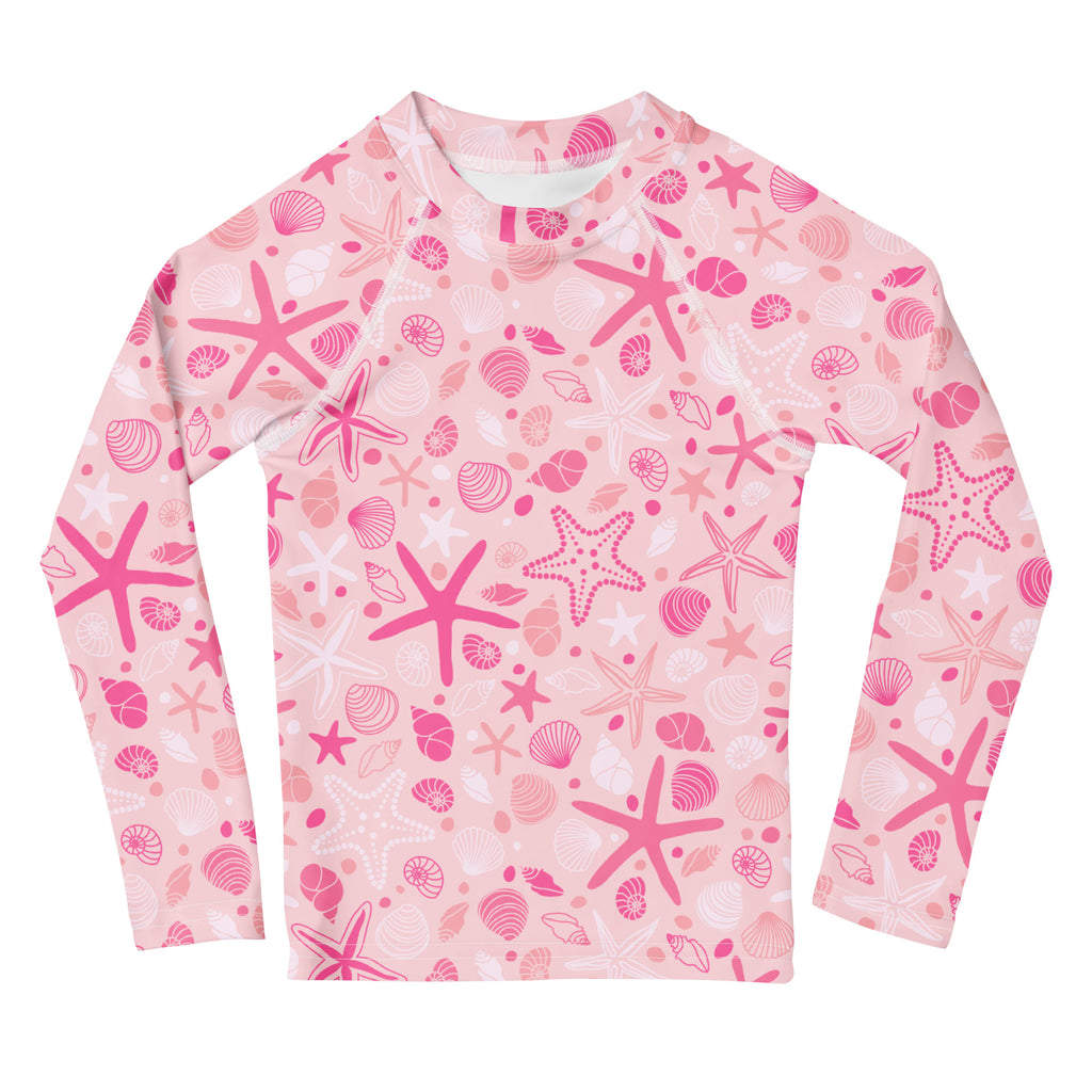 Girls pink starfish and seashell long sleeve rash guard swim shirt with upf 50 plus featuring playful ocean print