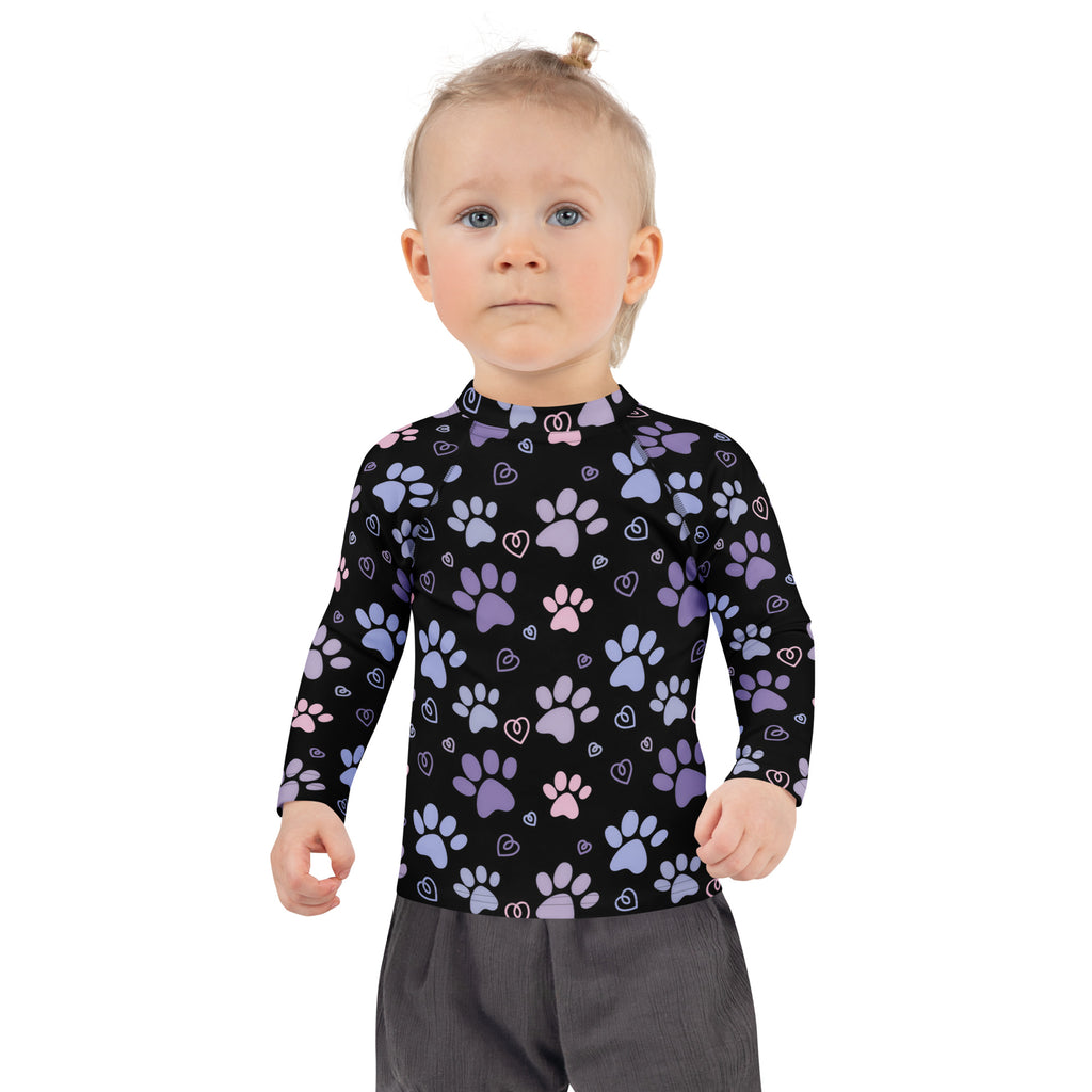 Girls purple and pink paw print long sleeve rash guard swim shirt with upf 50 plus featuring playful paw and heart pattern
