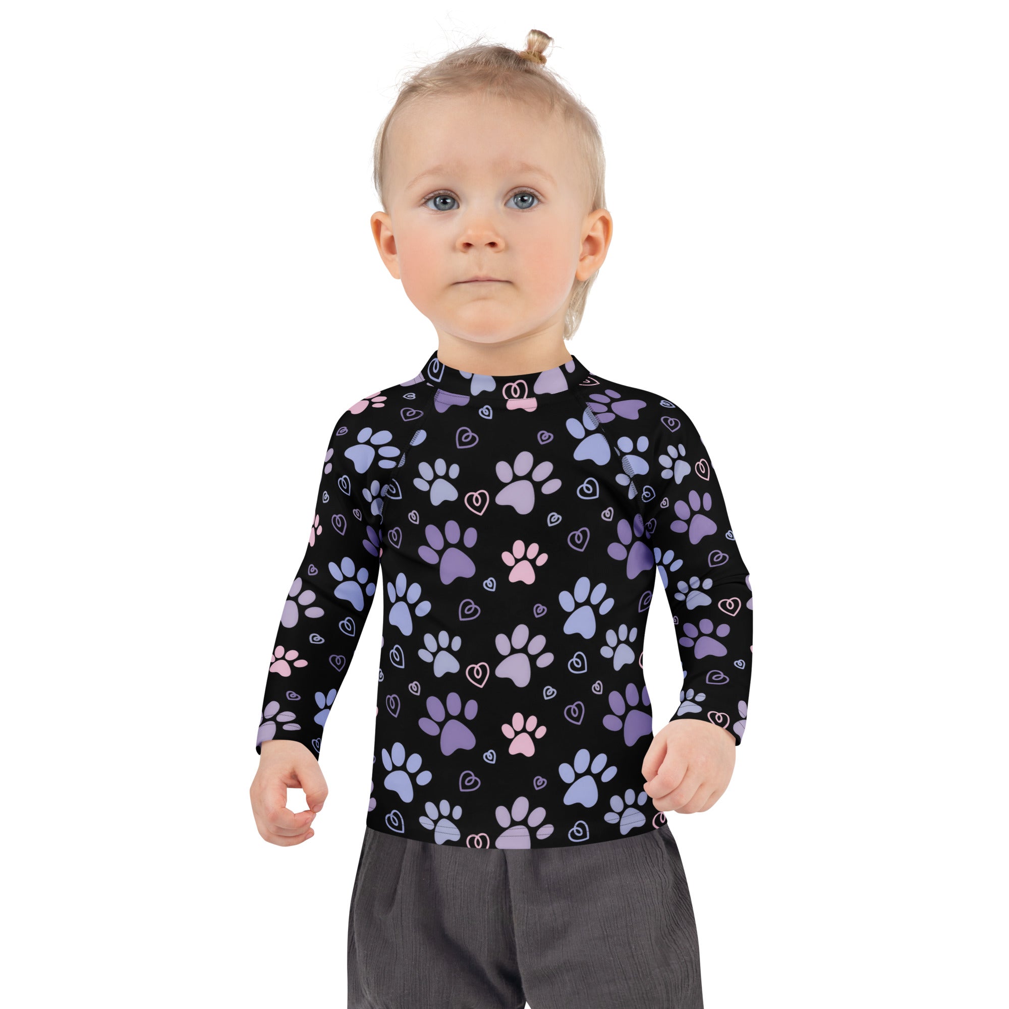 Girls purple and pink paw print long sleeve rash guard swim shirt with upf 50 plus featuring playful paw and heart pattern