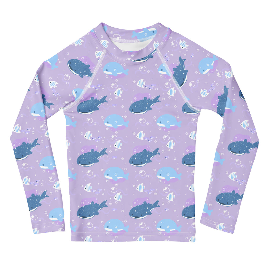 Girls purple long sleeve rash guard swim shirt with UPF 50 plus featuring blue and gray sharks and white fish pattern