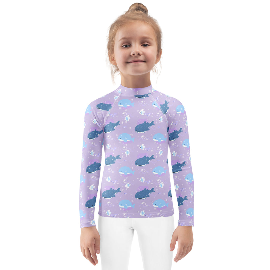 Girls purple whale shark long sleeve rash guard swim shirt with upf 50 plus featuring a blue whale and fish pattern