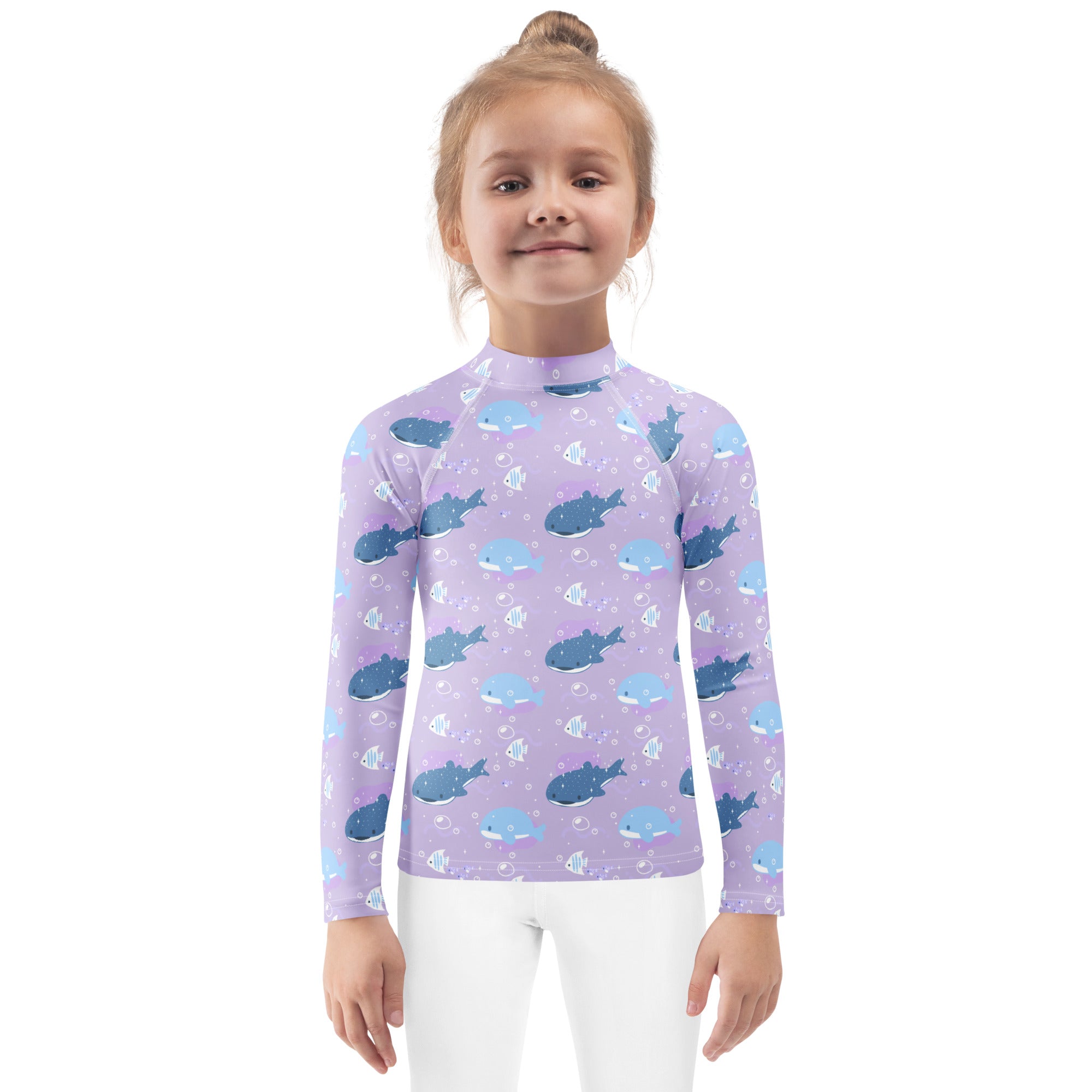 Girls purple whale shark long sleeve rash guard swim shirt with upf 50 plus featuring a blue whale and fish pattern