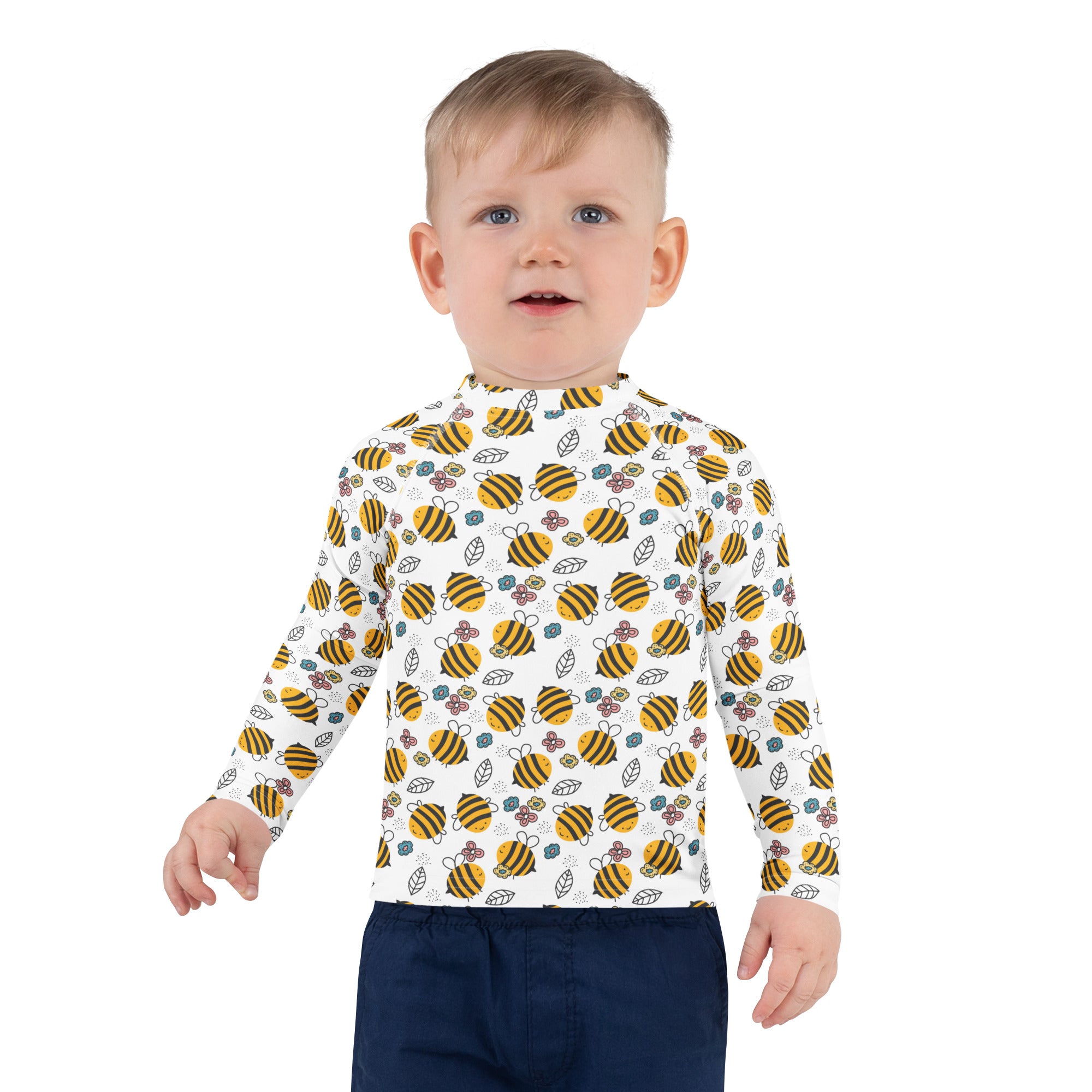 White long-sleeved kids rash guard swim shirt with yellow black bumblebee and floral patterns and upf 50+ protection