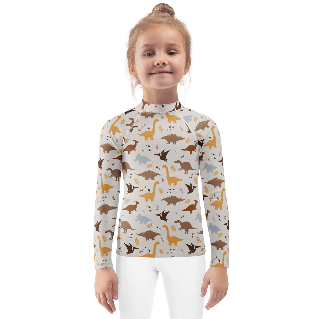 Kids dinosaur long sleeve rash guard swim shirt in light gray with cartoon dinosaurs and foliage print, UPF 50+ protection