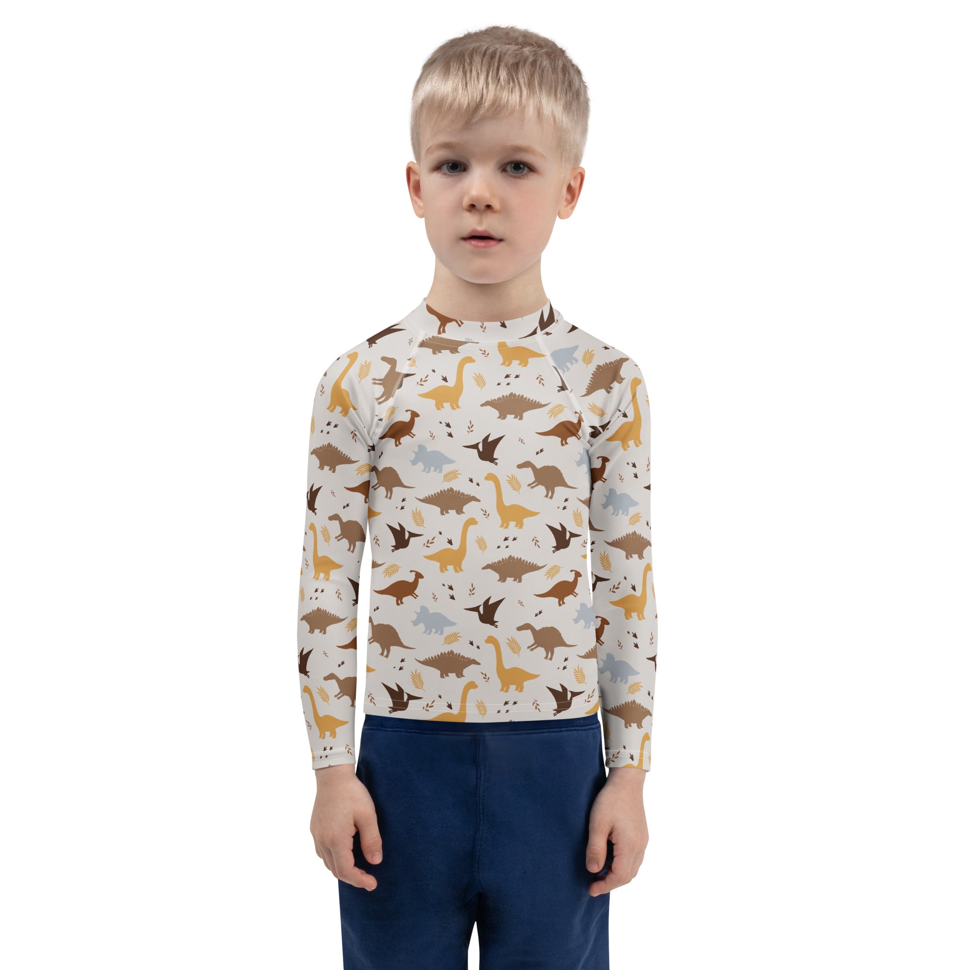 Kids dinosaur long sleeve rash guard swim shirt with upf 50 plus featuring brown tan and gray dinosaurs on off white background