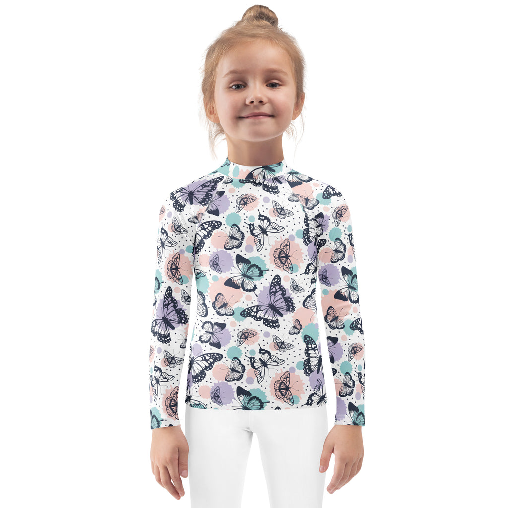 Girls butterfly long sleeve rash guard swim shirt with upf 50 plus featuring pastel butterfly pattern on white background