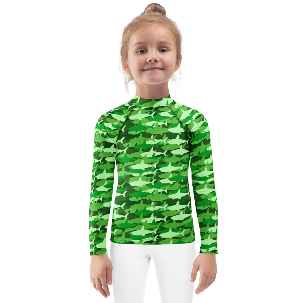 Kids green shark long sleeve rash guard with upf 50 plus featuring a camouflage pattern of green shark silhouettes