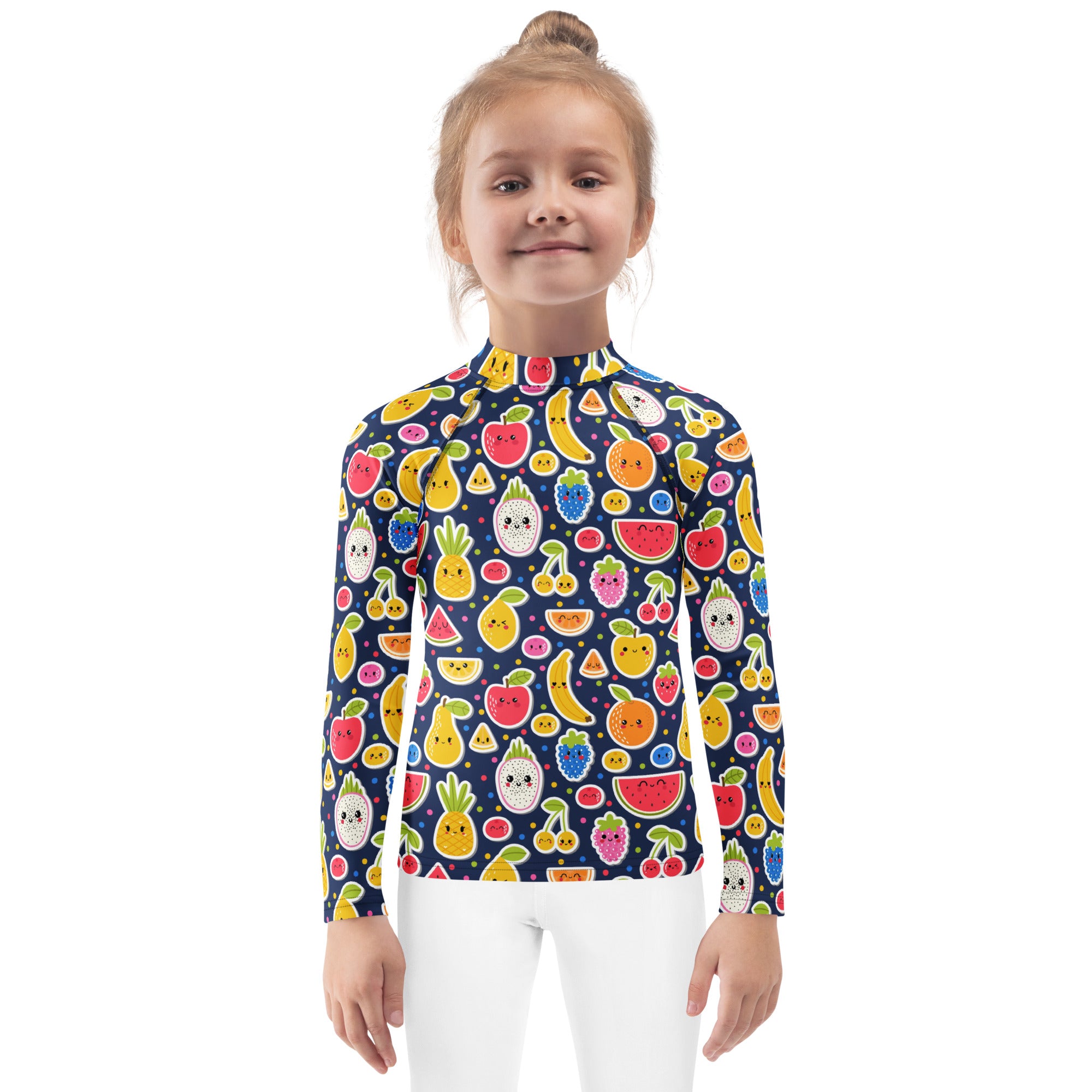 A child wearing a navy blue kids emoji fruit long sleeve rash guard swim shirt with colorful fruit characters and UPF 50+