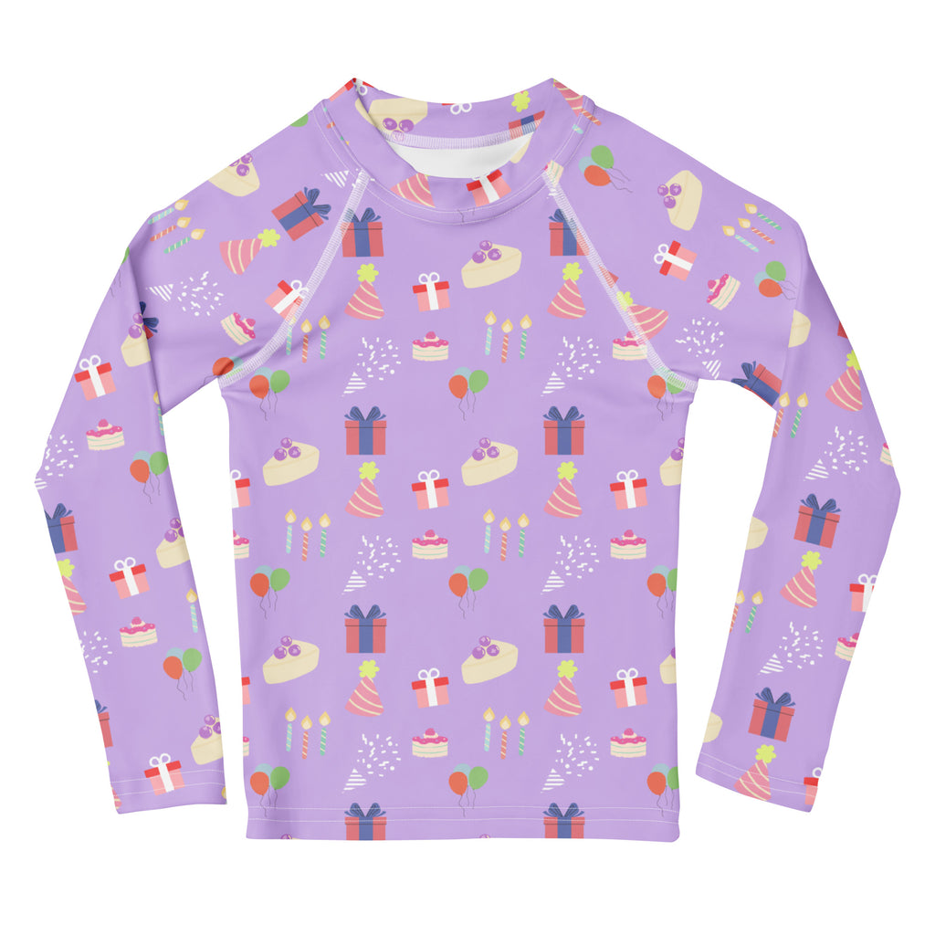 Girls purple long sleeve rash guard swim shirt with playful birthday pattern and UPF 50 plus sun protection