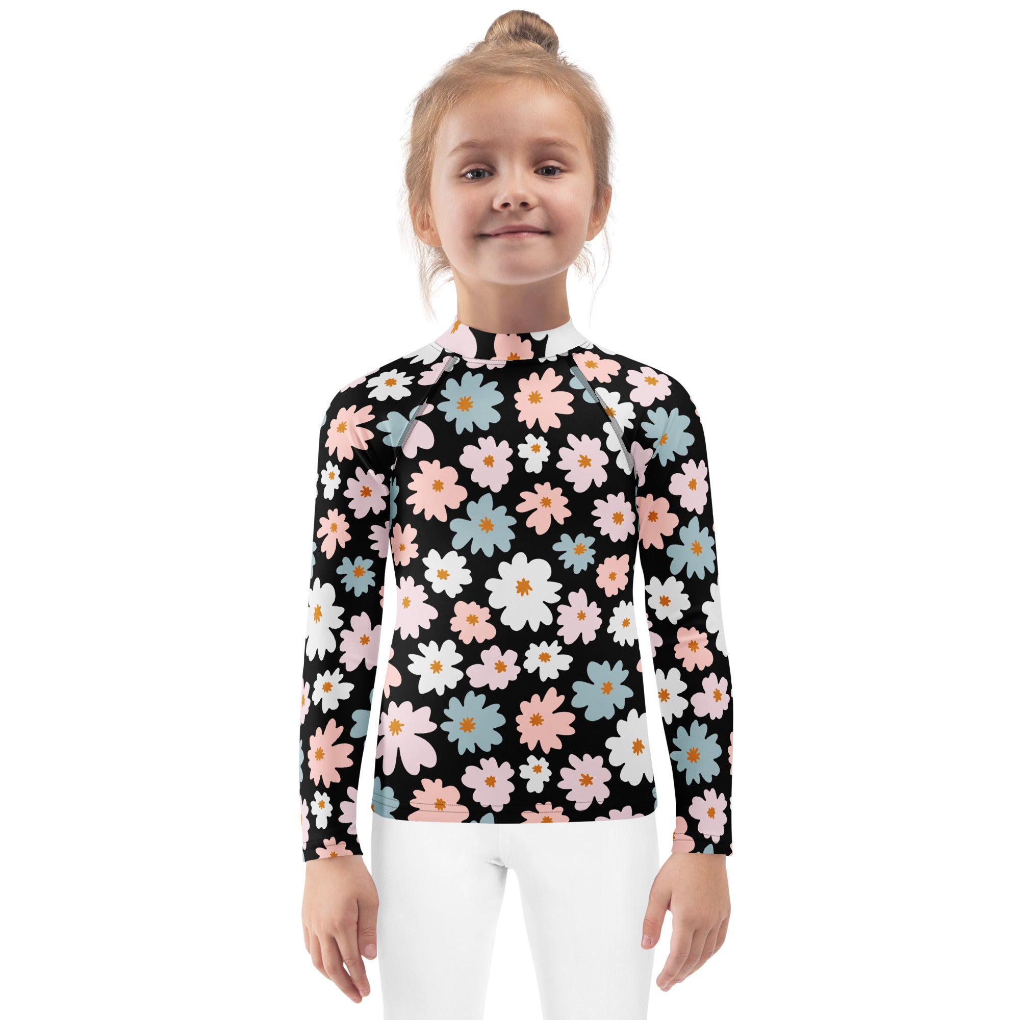 Black long sleeve girls rash guard swim shirt with pink white and blue daisies and upf 50 plus sun protection