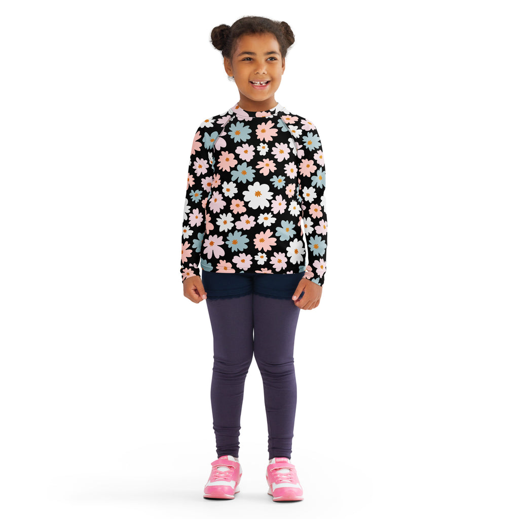 Girls flower scale long sleeve rash guard swim shirt in black with colorful pink white and blue floral pattern upf 50+