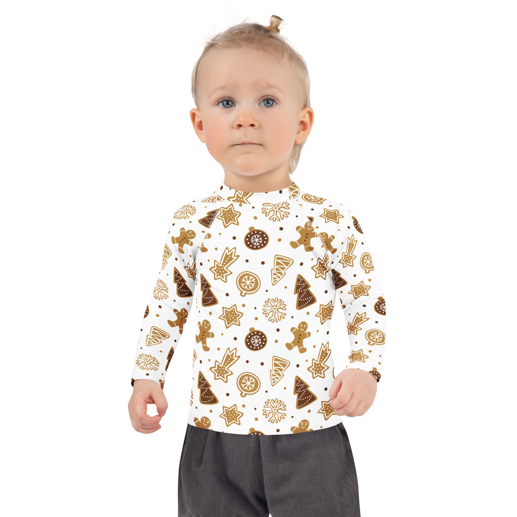White long-sleeve kids rash guard swim shirt with brown gingerbread men christmas trees snowflakes and upf 50+ protection