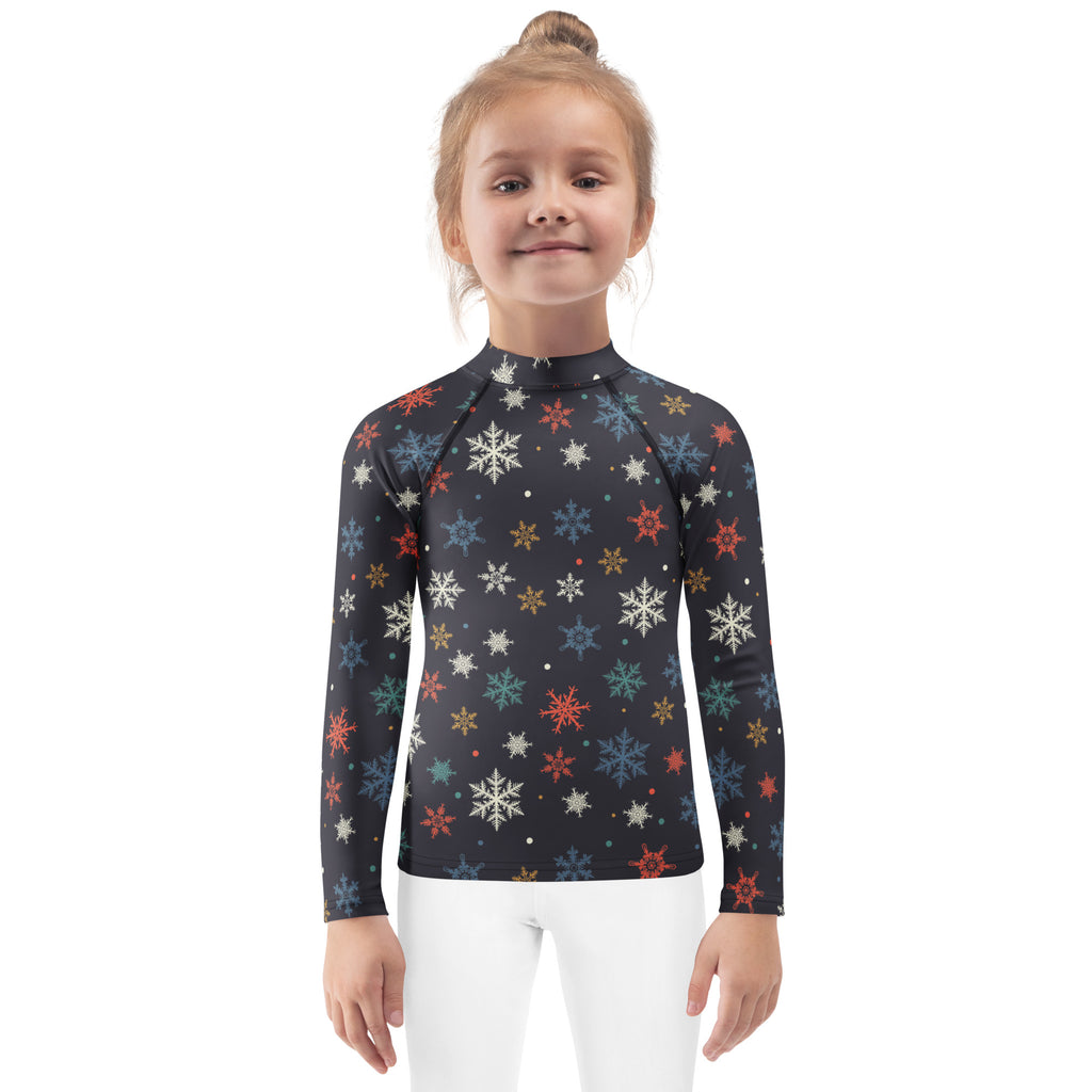 Kids colorful snowflakes long sleeve rash guard swim shirt in black with multicolored snowflake pattern and upf 50+ protection