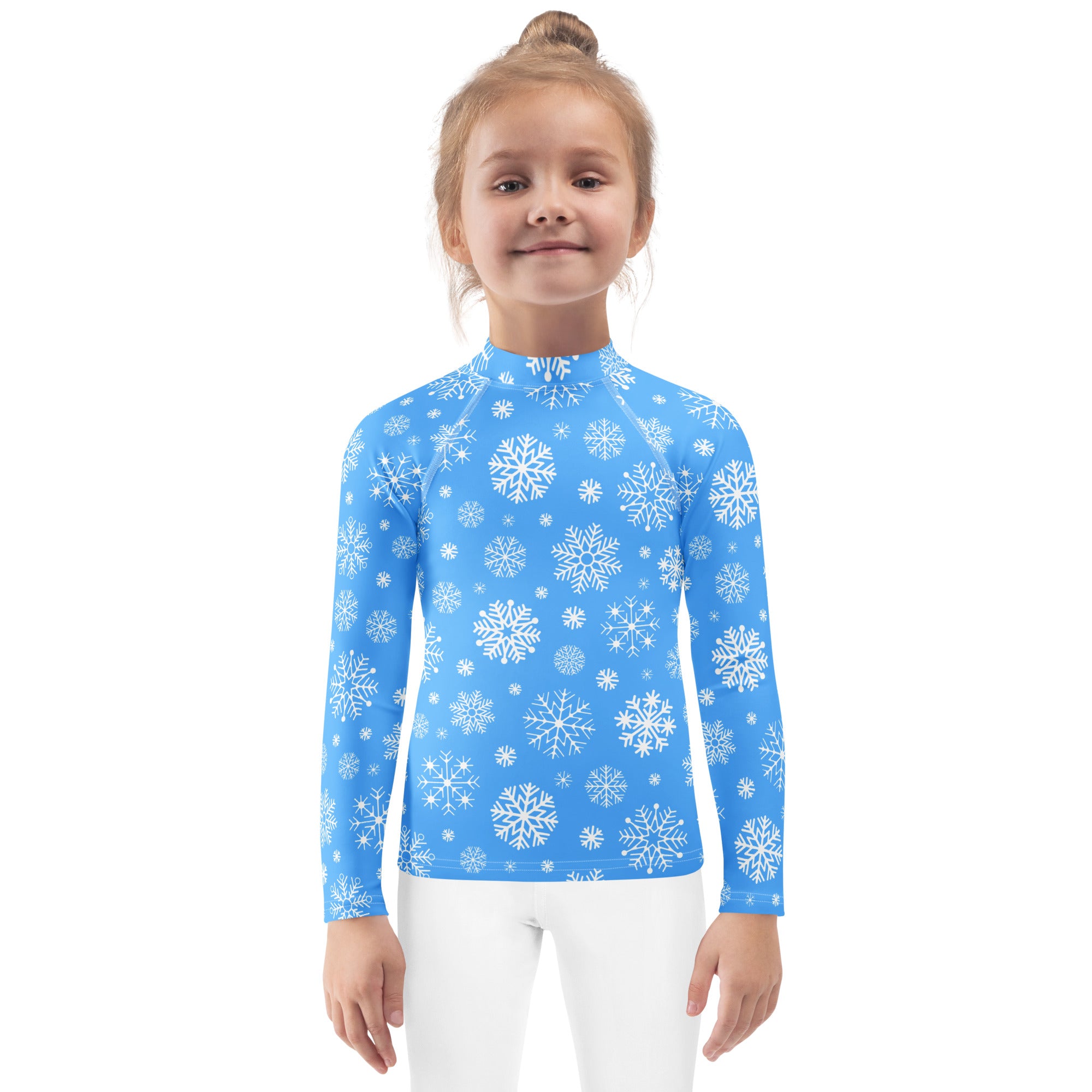 Kids blue long sleeve rash guard swim shirt with white snowflake pattern and UPF 50 plus sun protection