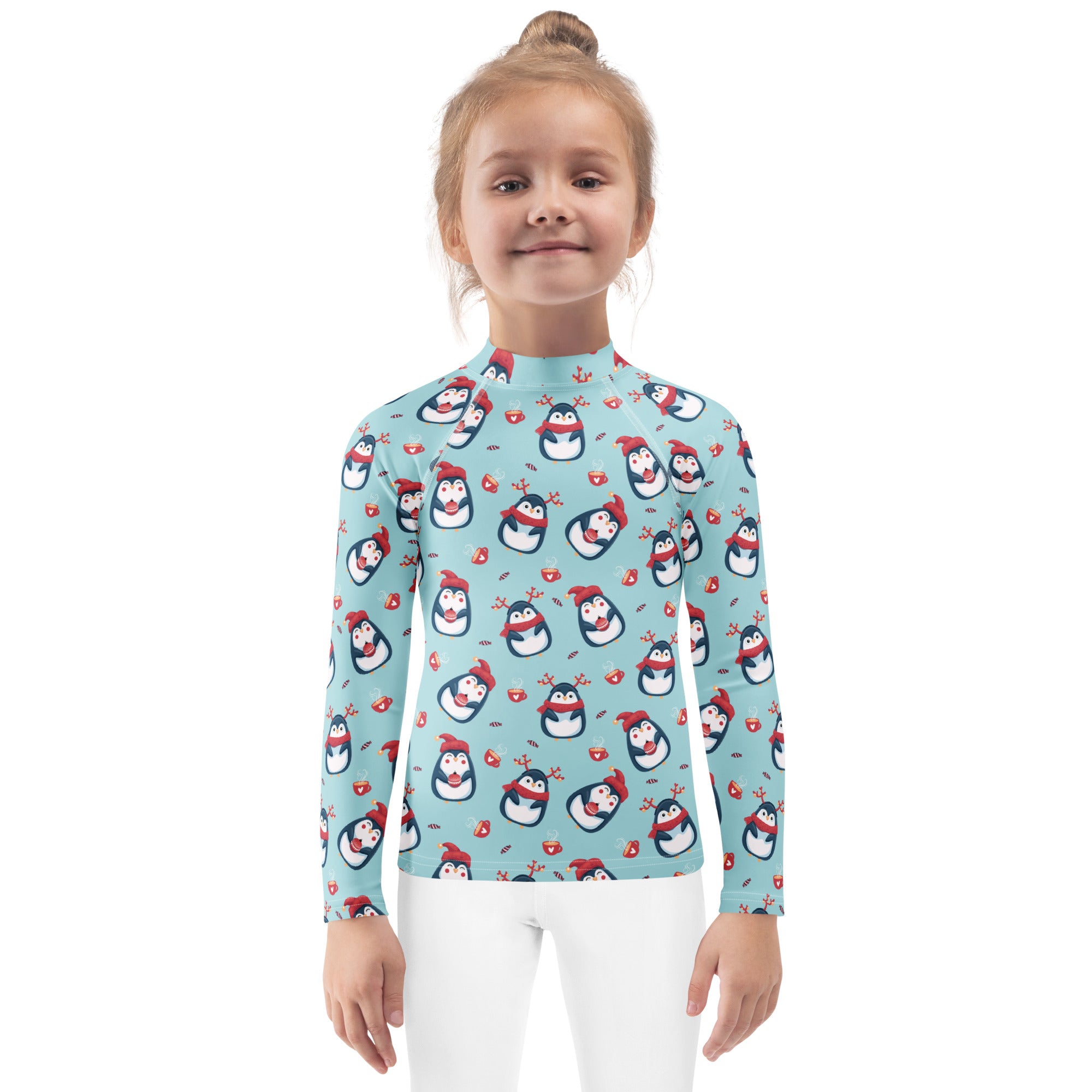 Kids reindeer penguin christmas long sleeve rash guard swim shirt in light blue with playful penguin and heart pattern and upf 50+