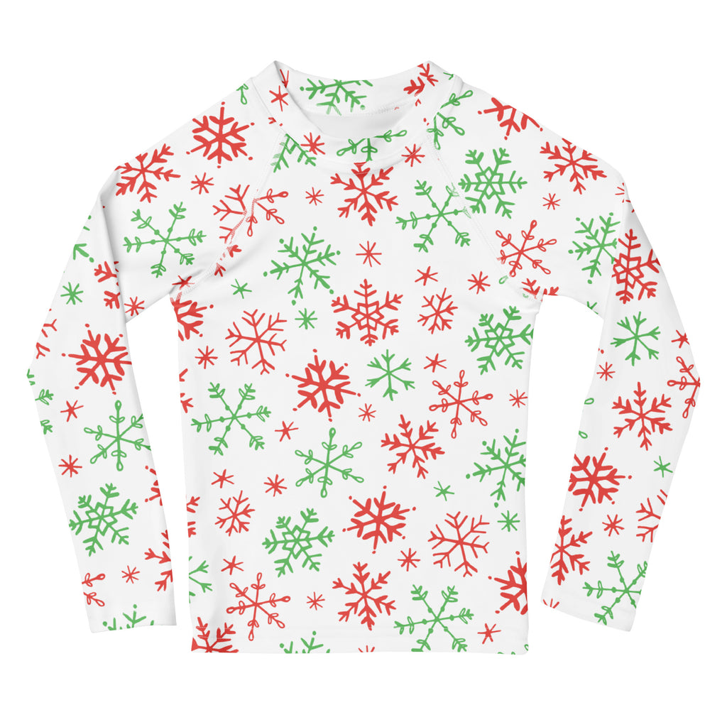 White long sleeve rash guard swim shirt with red and green snowflake festive pattern and upf 50 plus protection for kids