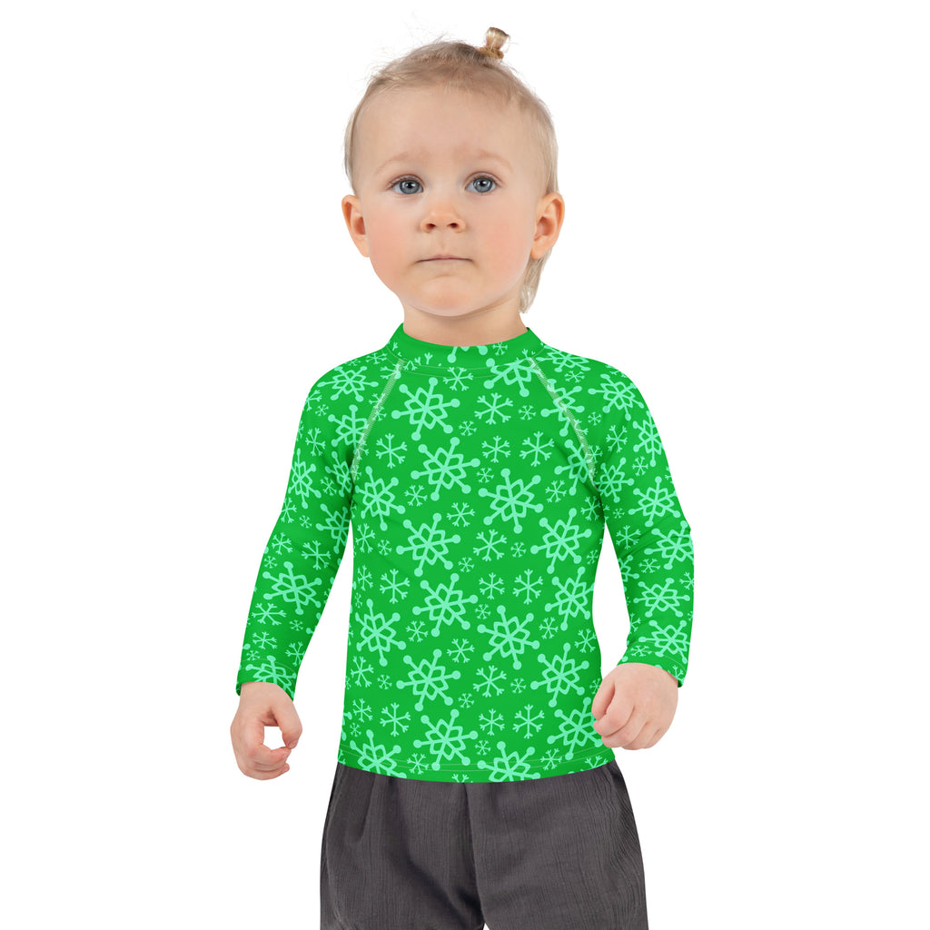 Kids green long sleeve rash guard with mint snowflake pattern and UPF 50 plus for Christmas swimwear protection
