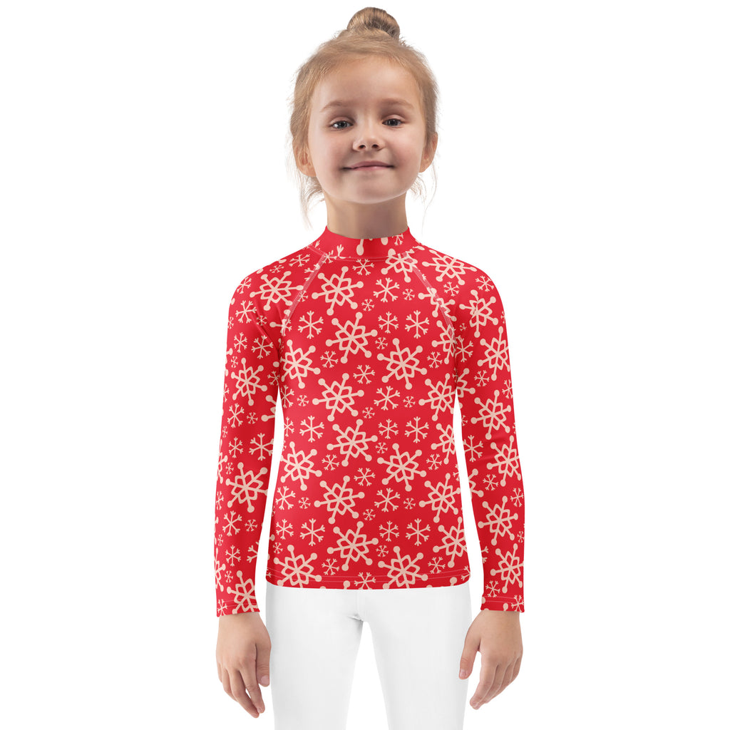 Kids red long sleeve rash guard with white snowflake pattern and upf 50 plus for christmas swim protection