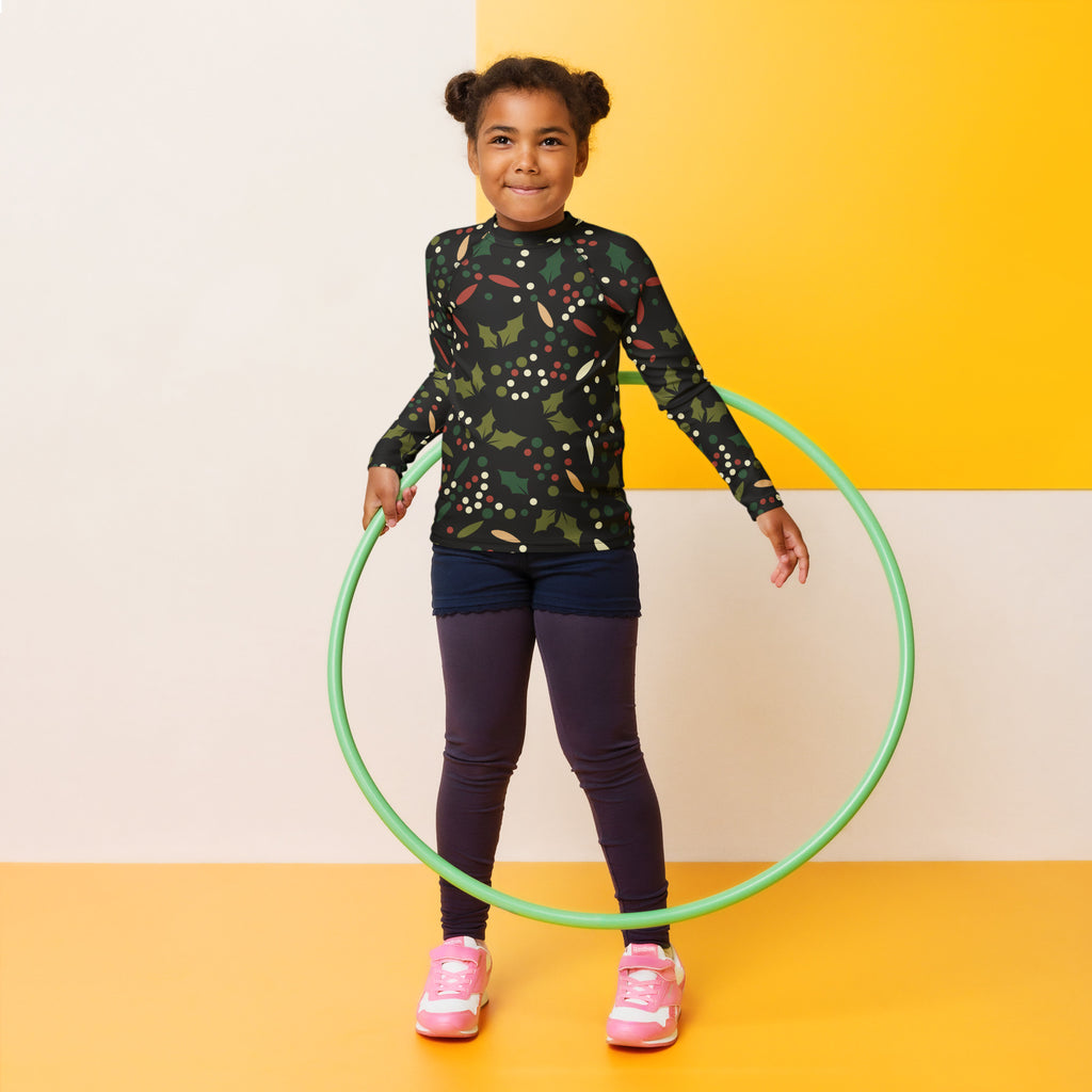 Green plastic hula hoop shown with kids holly christmas long sleeve rash guard swim shirt with upf 50 plus