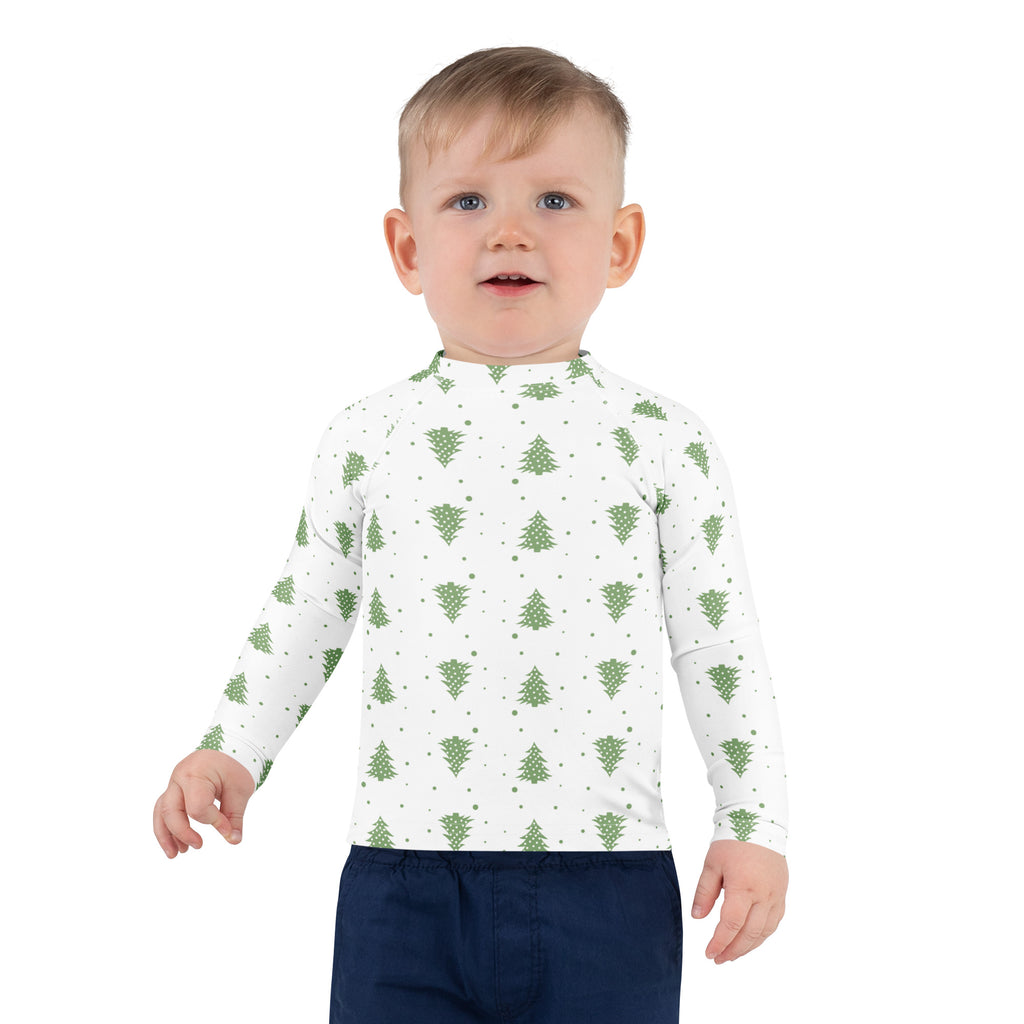 White kids long sleeve rash guard swim shirt with green pine tree dot pattern and upf 50 plus sun protection