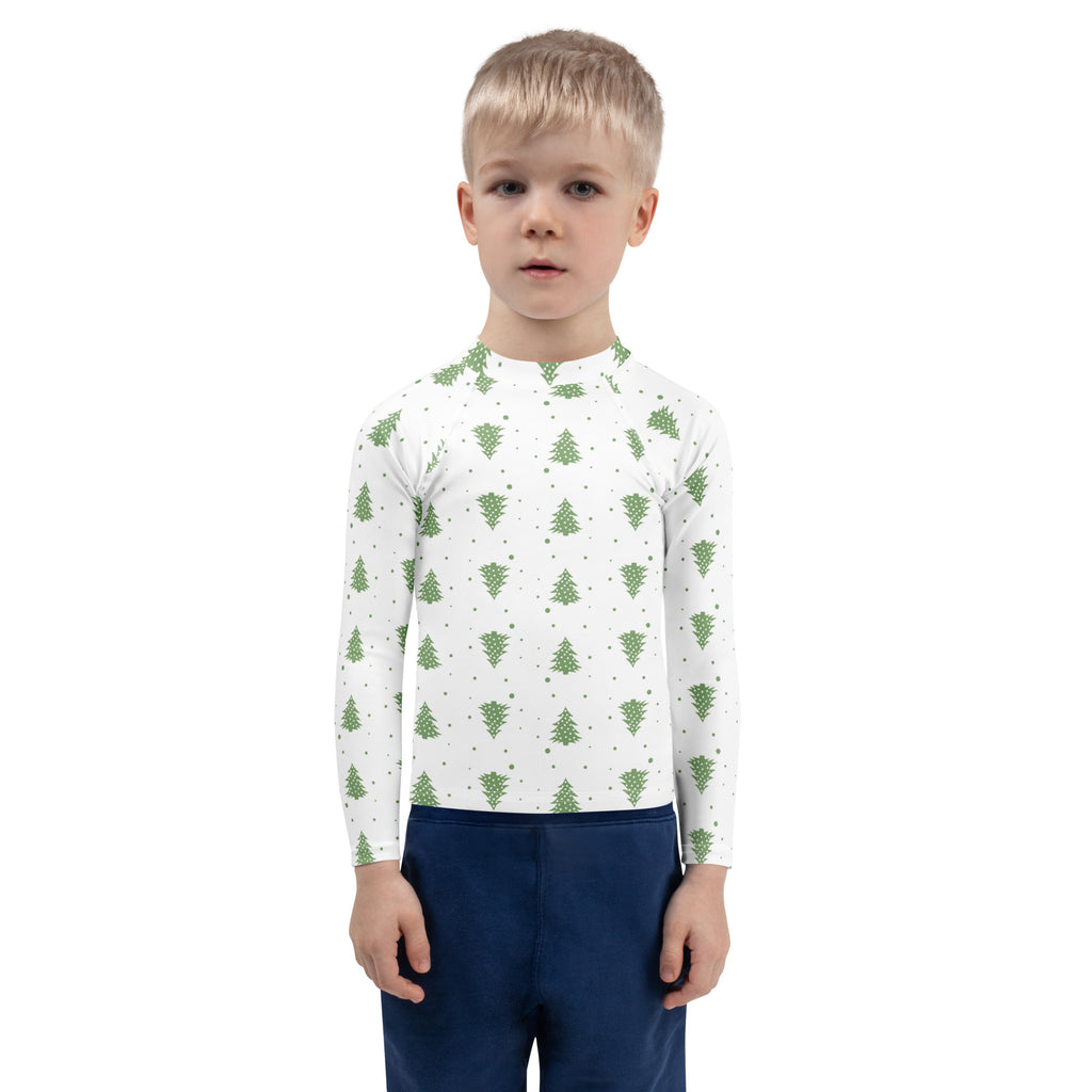 White long-sleeved kids rash guard with green pine tree pattern and upf 50 plus for swim and sun protection