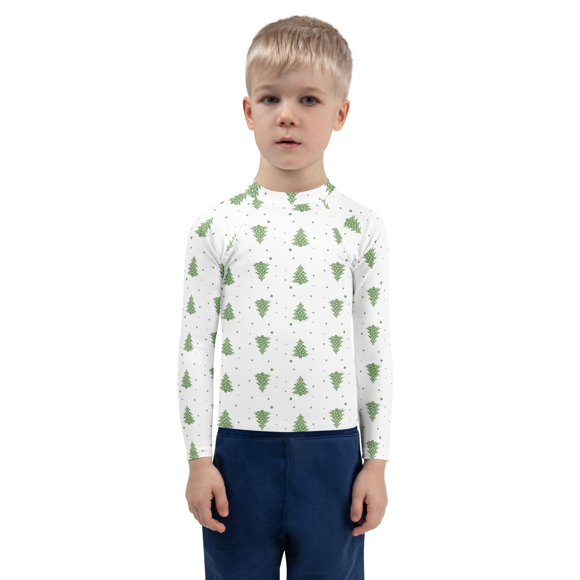 White long-sleeved kids rash guard with green pine tree pattern and upf 50 plus for swim and sun protection