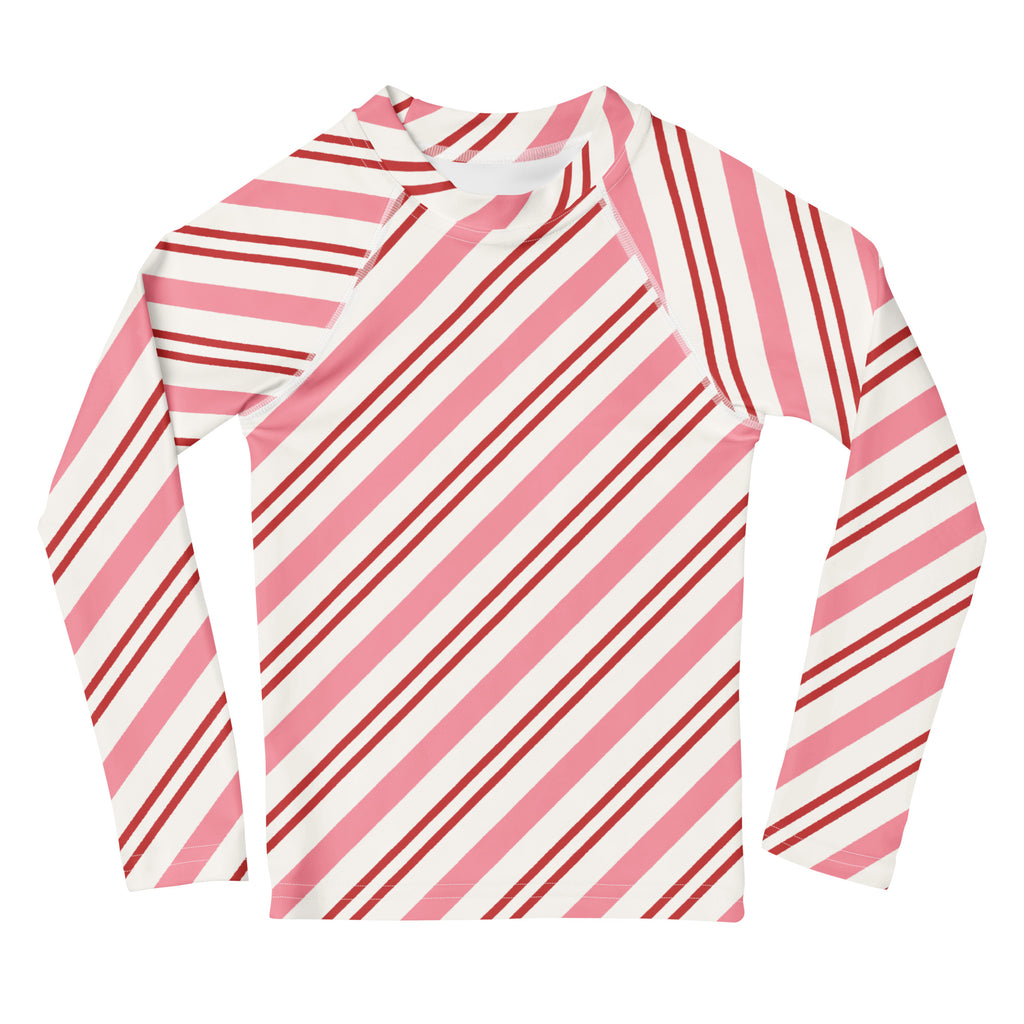 Kids pink peppermint stripe Christmas long sleeve rash guard swim shirt with diagonal pink white stripes and UPF 50+ protection