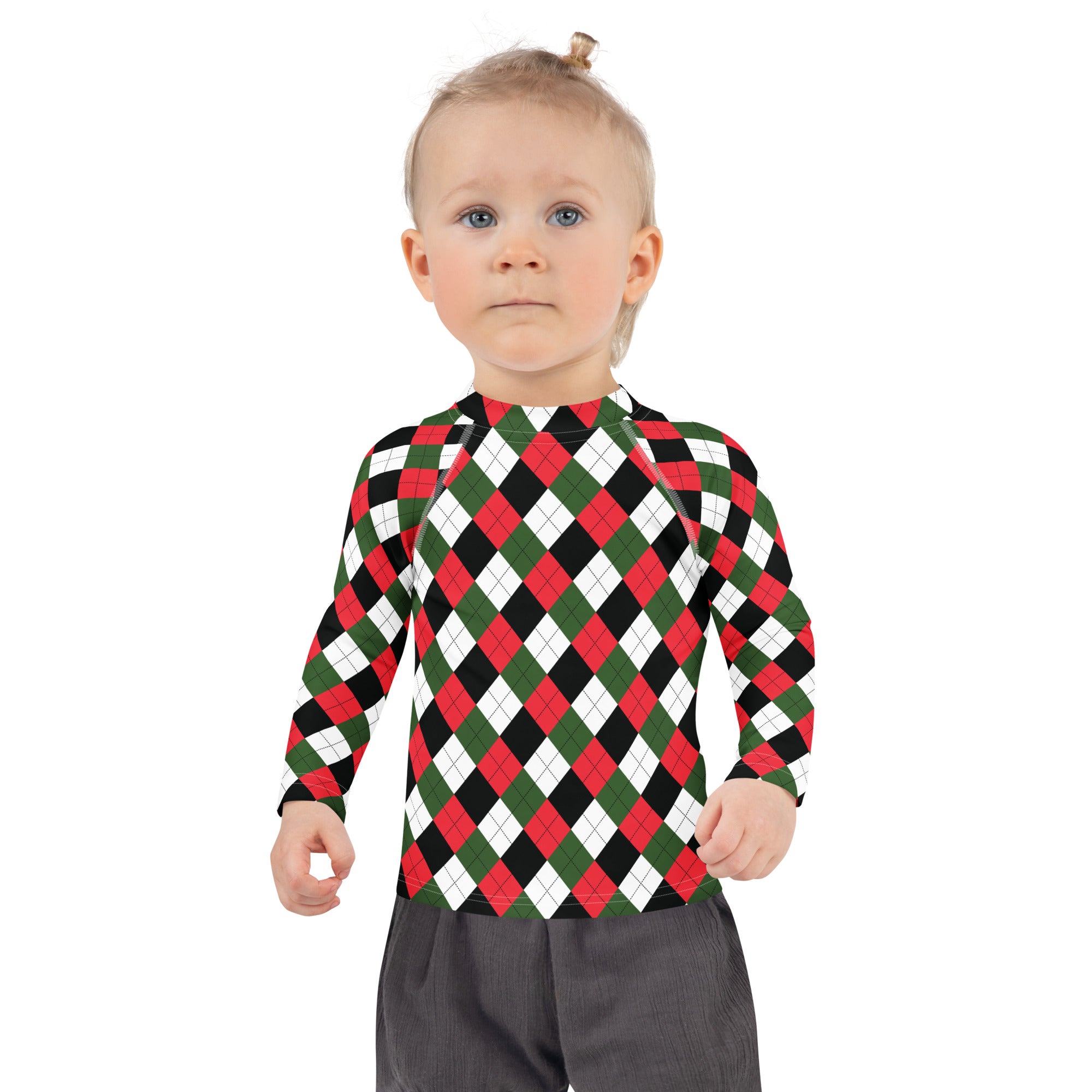 A child wearing a kids christmas argyle long sleeve rash guard swim shirt with upf 50 plus in red green black and white