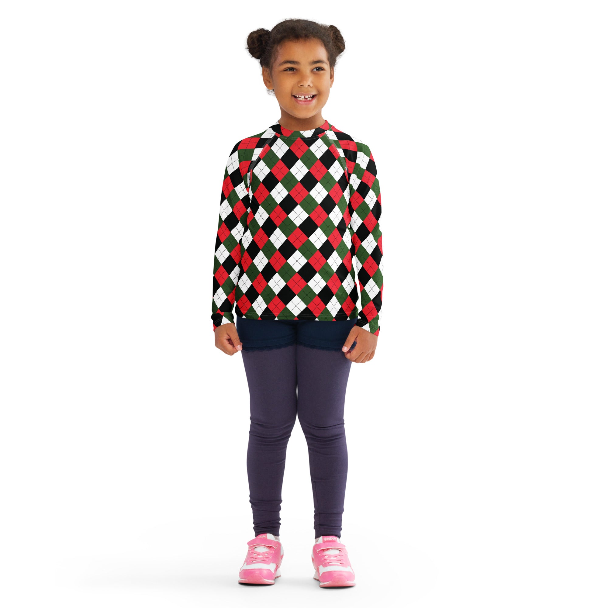 A child wearing a kids christmas argyle long sleeve rash guard swim shirt with upf 50 plus in red green black and white