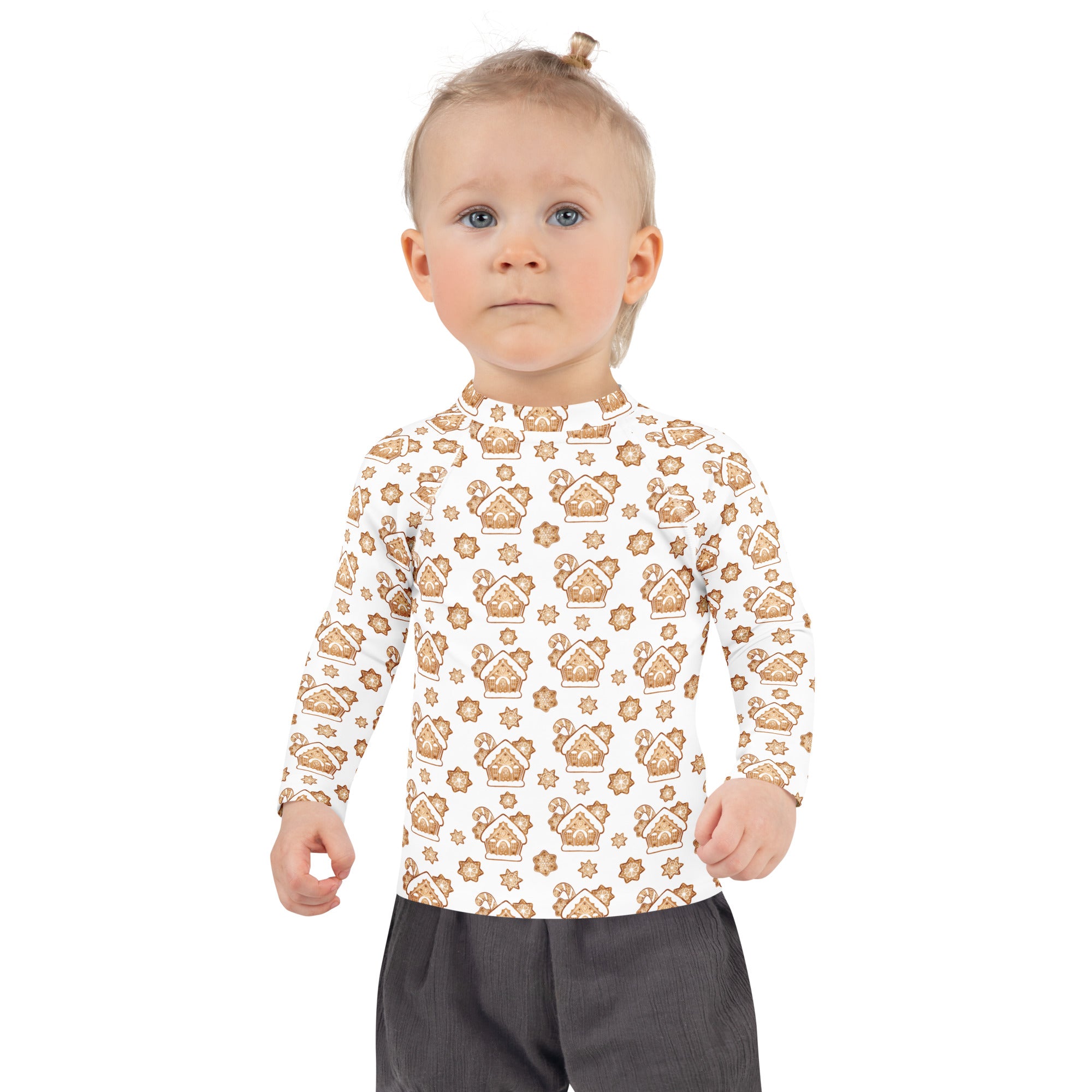 White long-sleeved kids rash guard swim shirt with brown gingerbread house pattern and upf 50+ sun protection