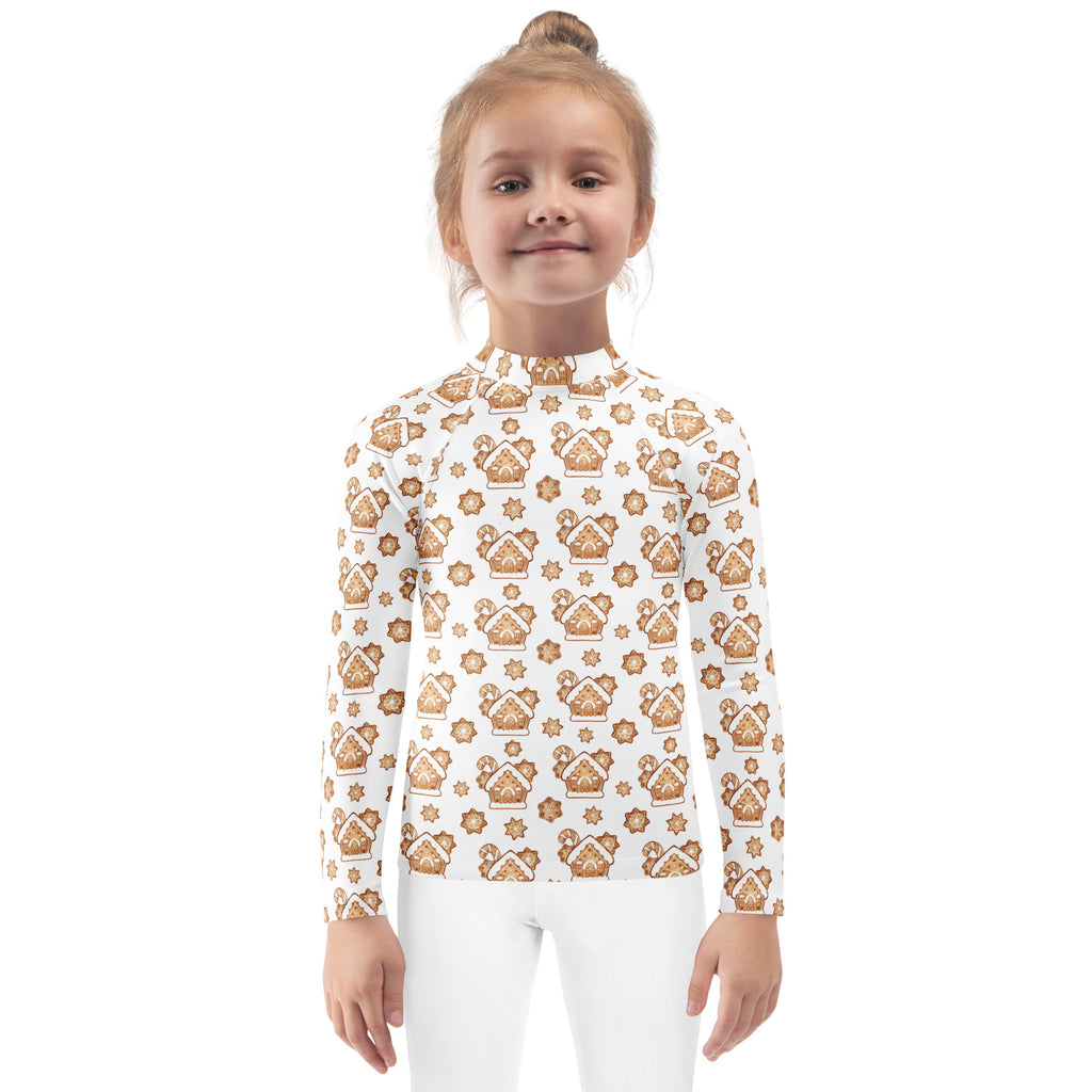 White long-sleeved kids rash guard with brown gingerbread house pattern and upf 50+ for christmas swimwear