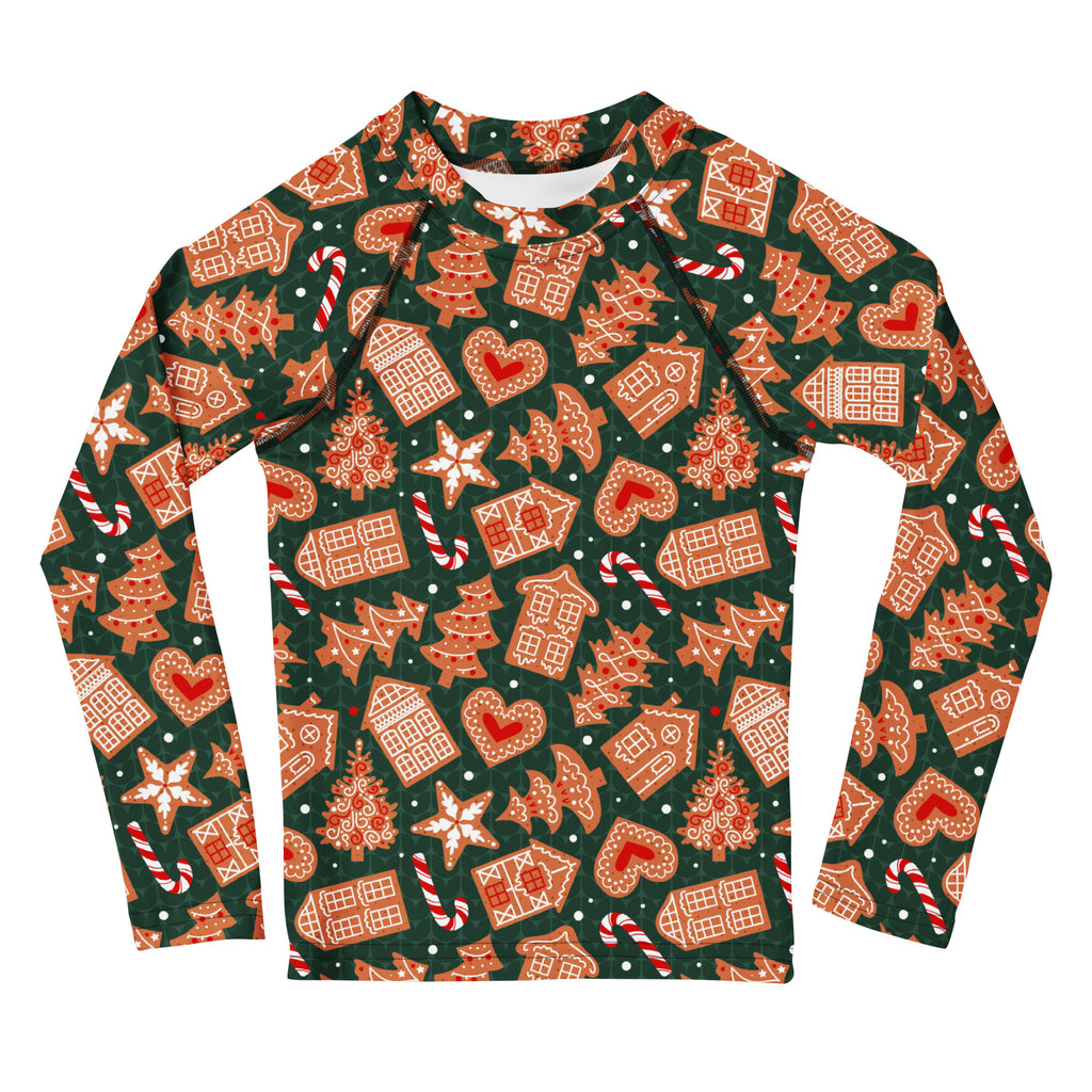 Kids green gingerbread christmas long sleeve rash guard swim shirt with upf 50 featuring festive gingerbread houses candy canes and trees