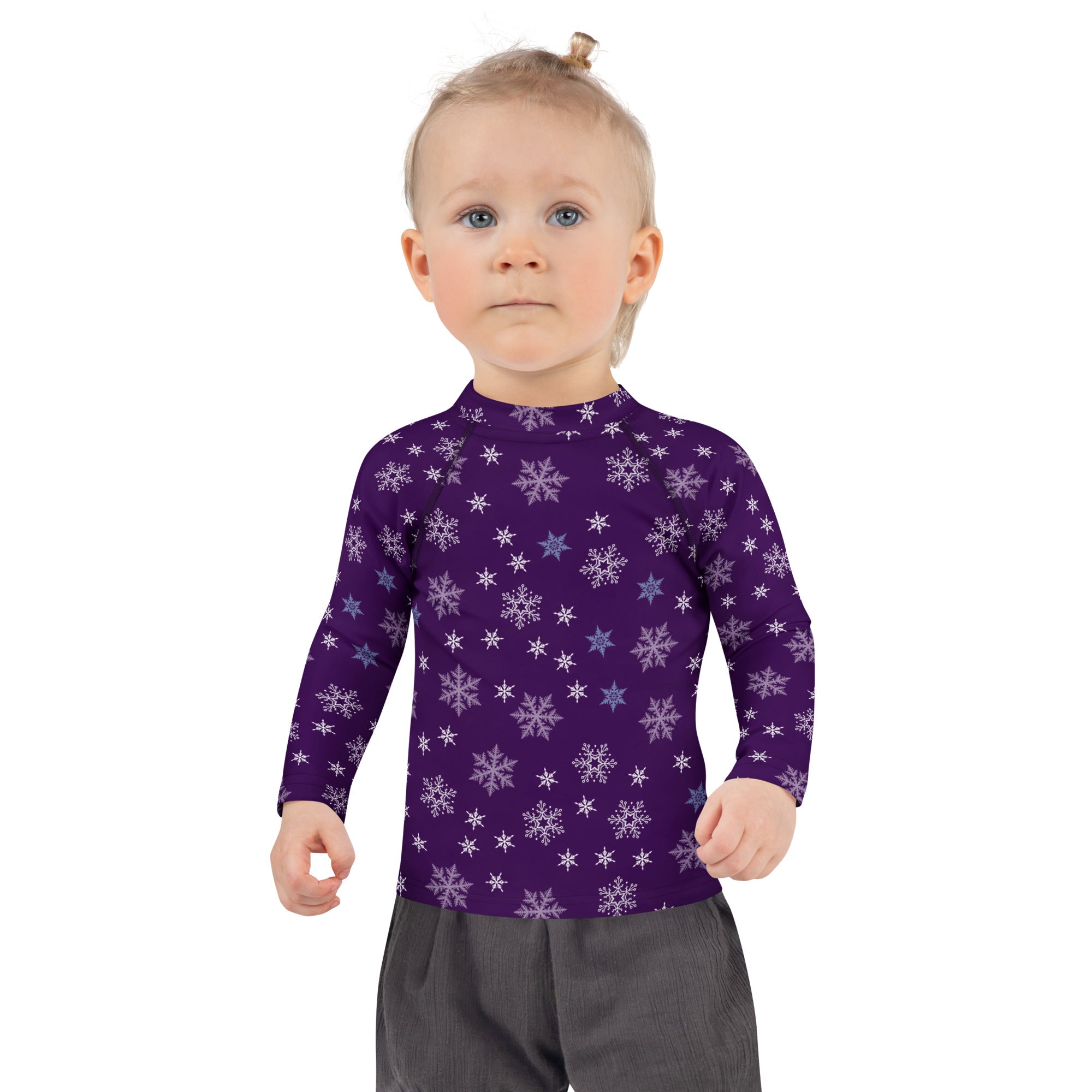Kids purple long sleeve rash guard swim shirt with white and light blue snowflake pattern and upf 50+ protection