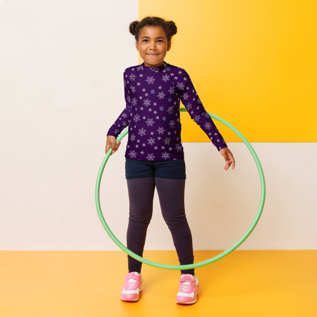 Green plastic hula hoop shown with kids purple snowflake christmas long sleeve rash guard swim shirt with upf 50+