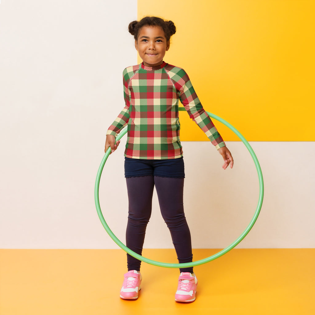 Green plastic hula hoop shown with kids christmas plaid long sleeve rash guard swim shirt with upf 50 plus