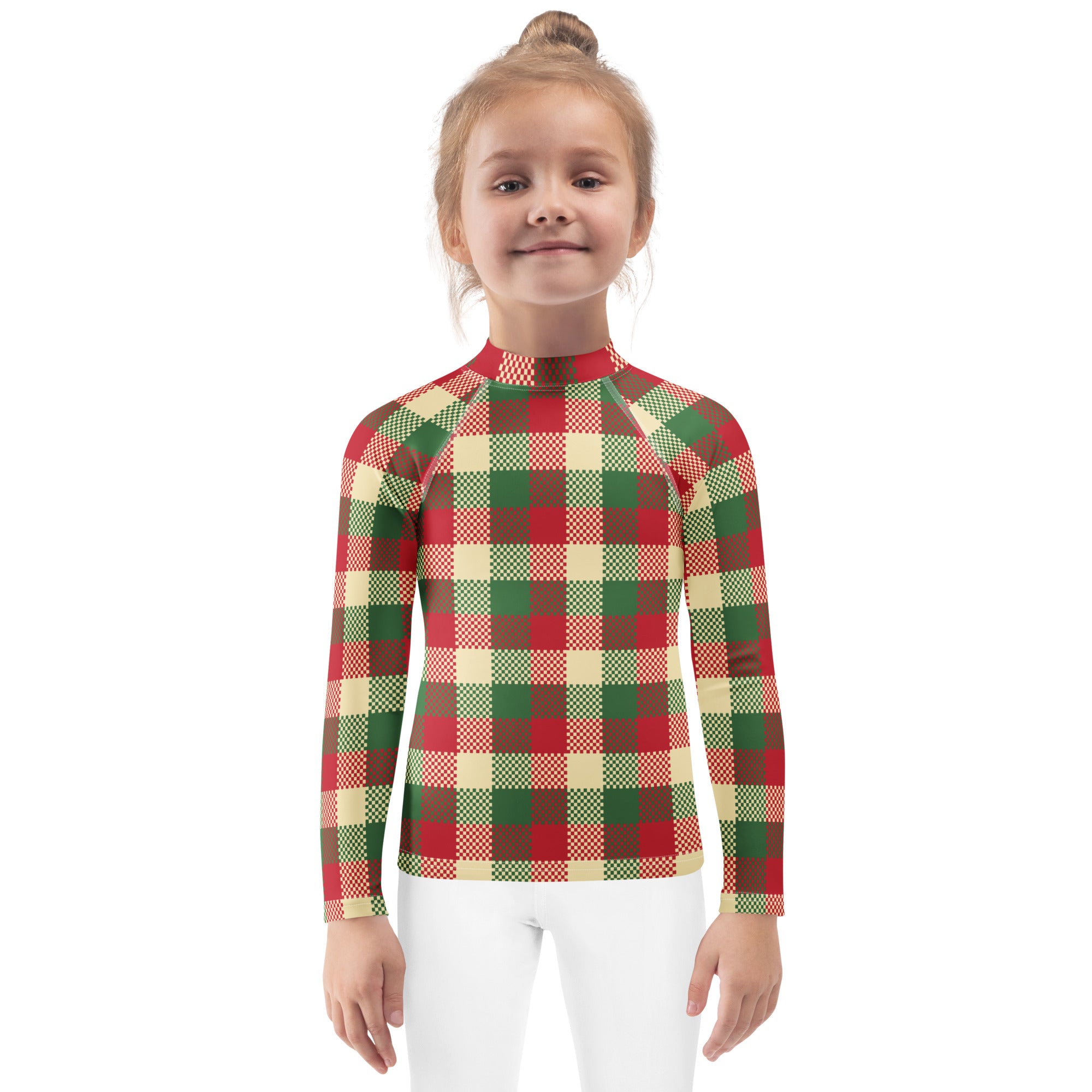 A child wearing a kids christmas plaid long sleeve rash guard swim shirt with upf 50 plus in festive red green and beige