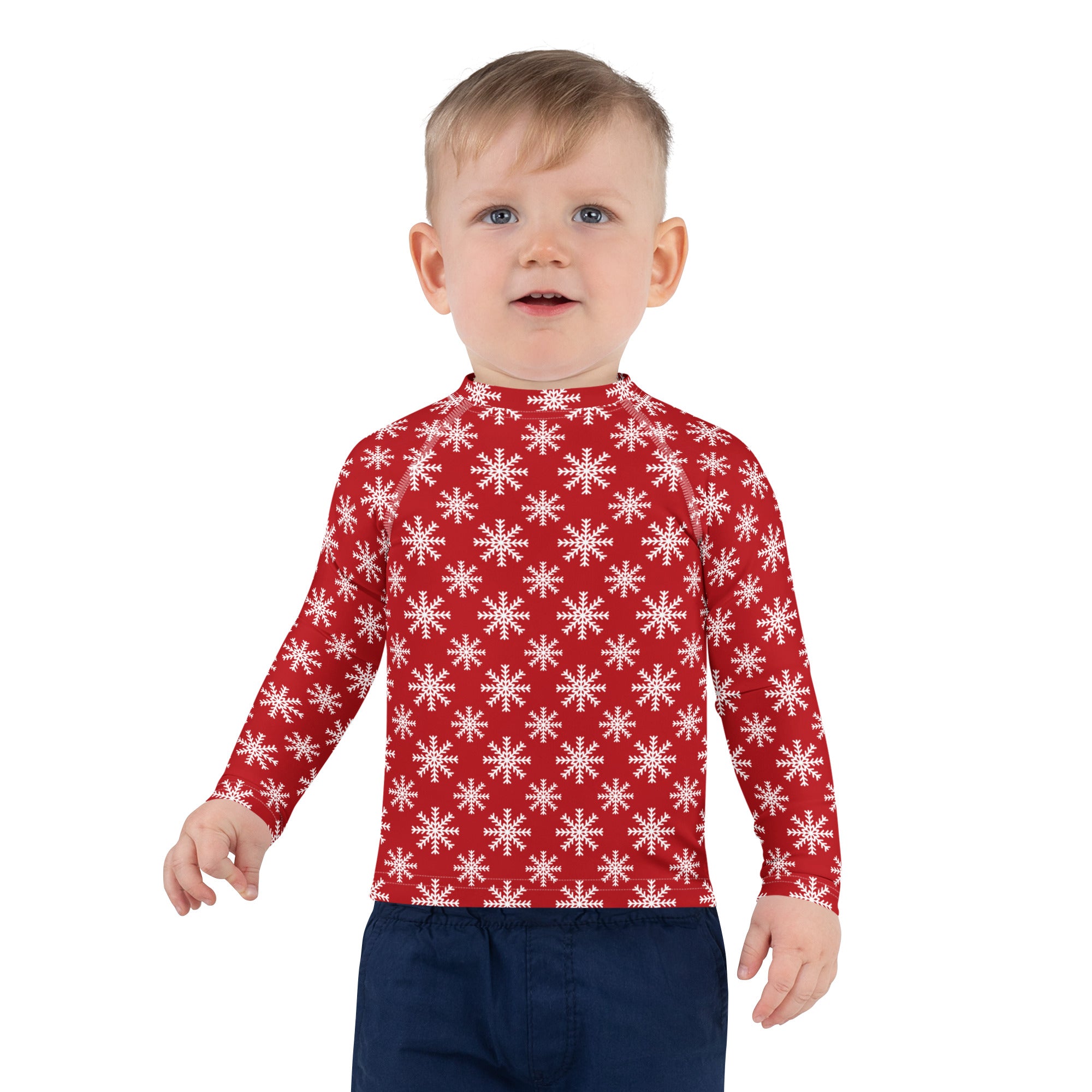 Kids red long sleeve rash guard swim shirt with white snowflake pattern and UPF 50 plus sun protection