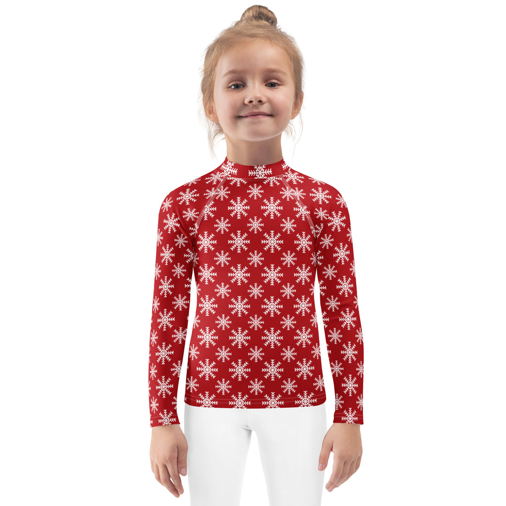Kids red long sleeve rash guard swim shirt with white snowflake pattern and UPF 50 plus for sun protection